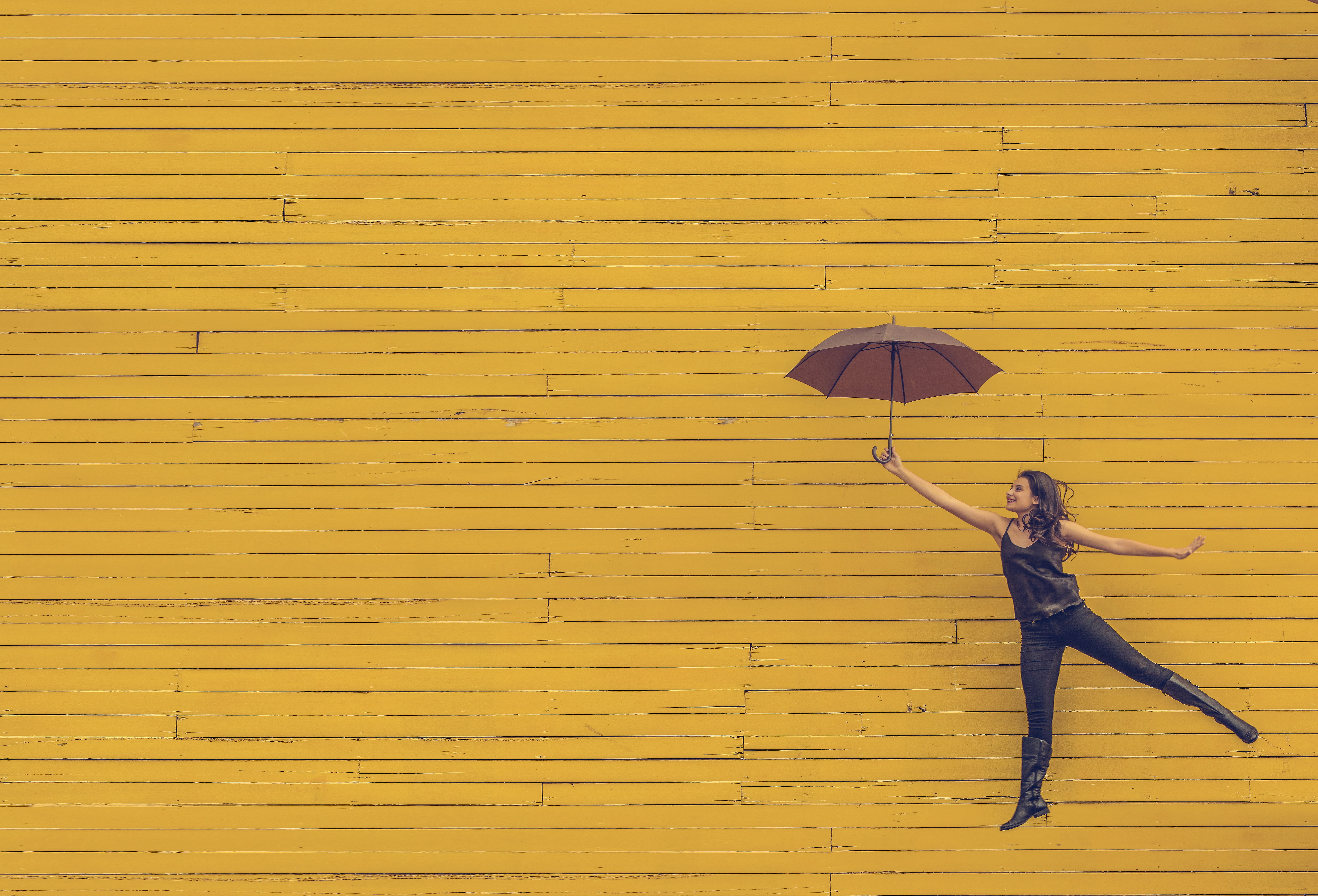 real people, young, lifestyles, young adult, people, women, fun, nature, attractive, outdoors, motion, urban, joy, floating, umbrella, yellow, yellow background, HD Wallpaper