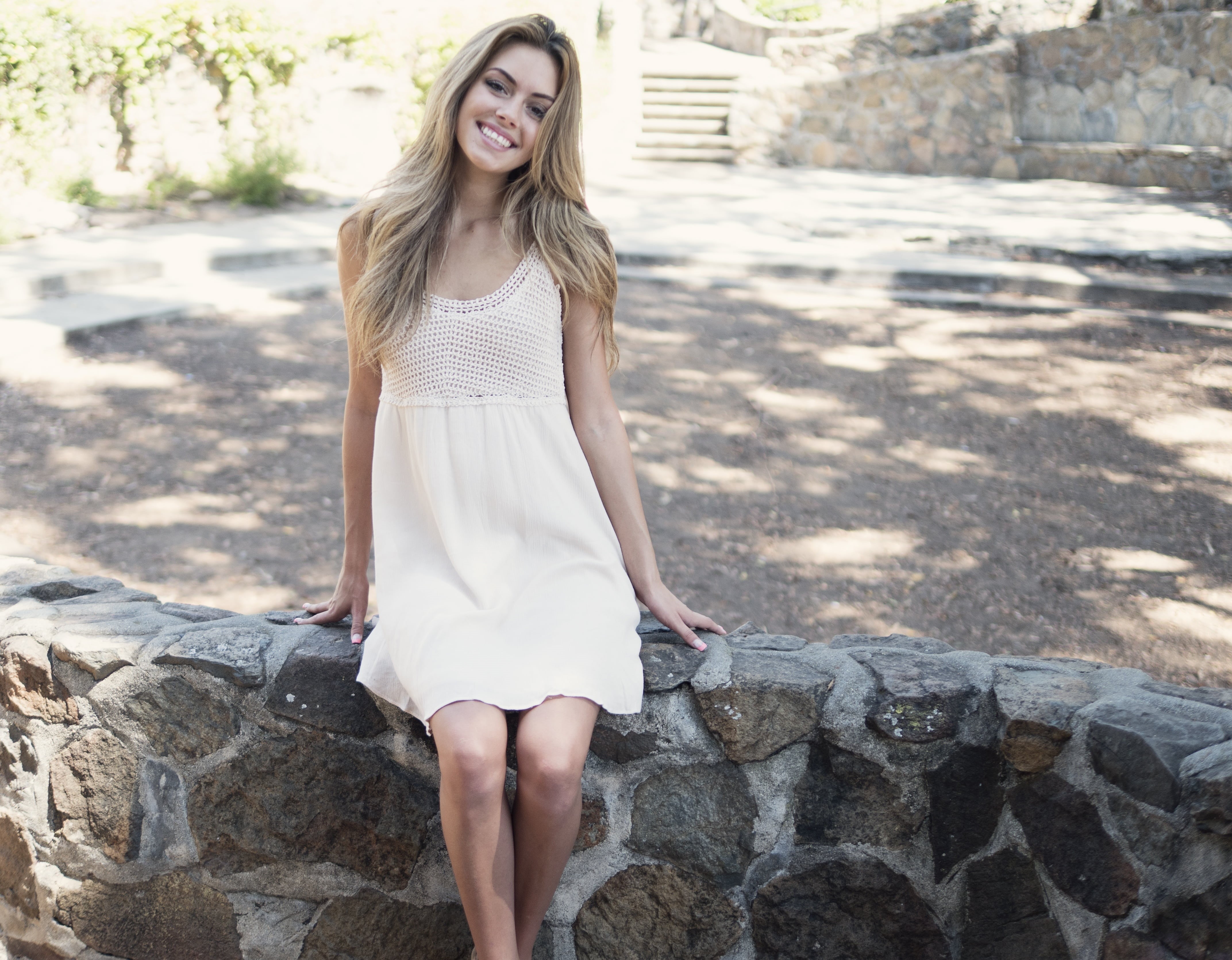 fashion, leisure activity, sitting, smile, woman smile, outdoors, rock, 4K, young women, face, happiness, front view, looking at camera, attractive, long hair, HD Wallpaper