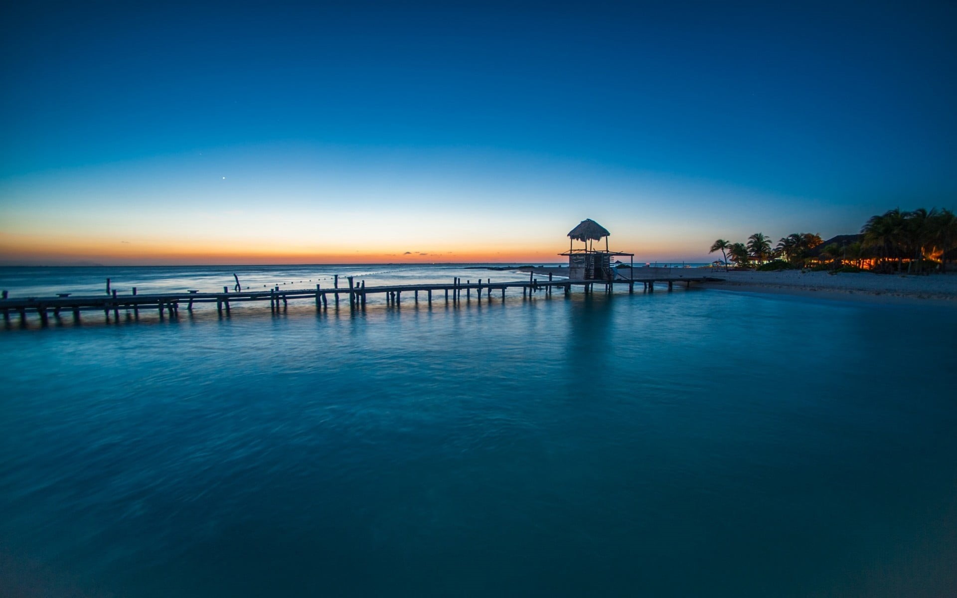 palm trees, sunset, sea, blue, clear sky, tranquil scene, waterfront, outdoors, copy space, walkway, no people, landscape, water, Mexico, land, architecture, HD Wallpaper