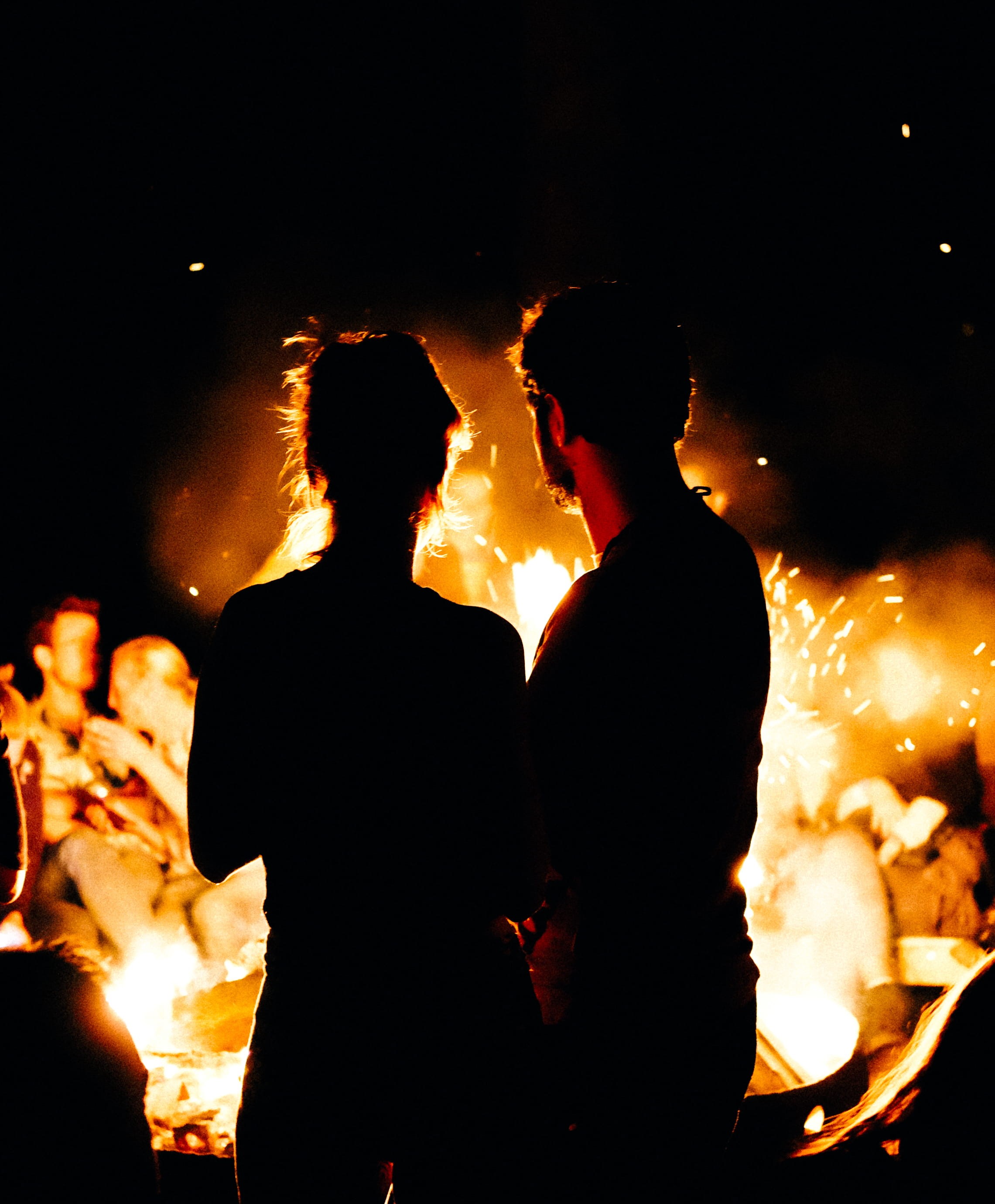 watching, leisure activity, glowing, fire, two people, couple, night, standing, burning, flame, silhouette, bonfire, firework, two, orange color, time, Phone HD Wallpaper