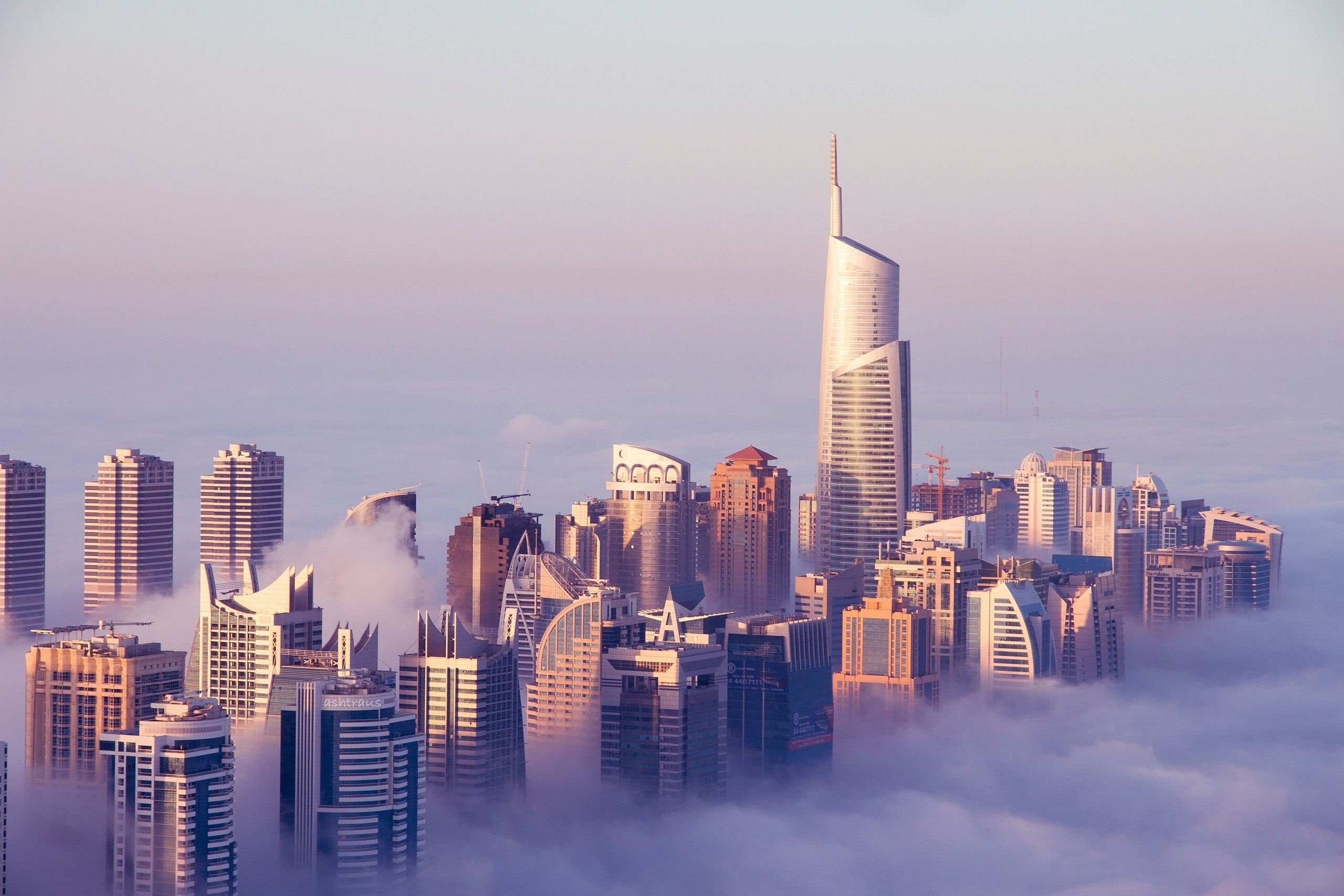 urban skyline, rise, tall - high, cityscape, financial district, no people, tower, building, clouds, mist, sky, high, sunset, modern, city life, Dubai, HD Wallpaper