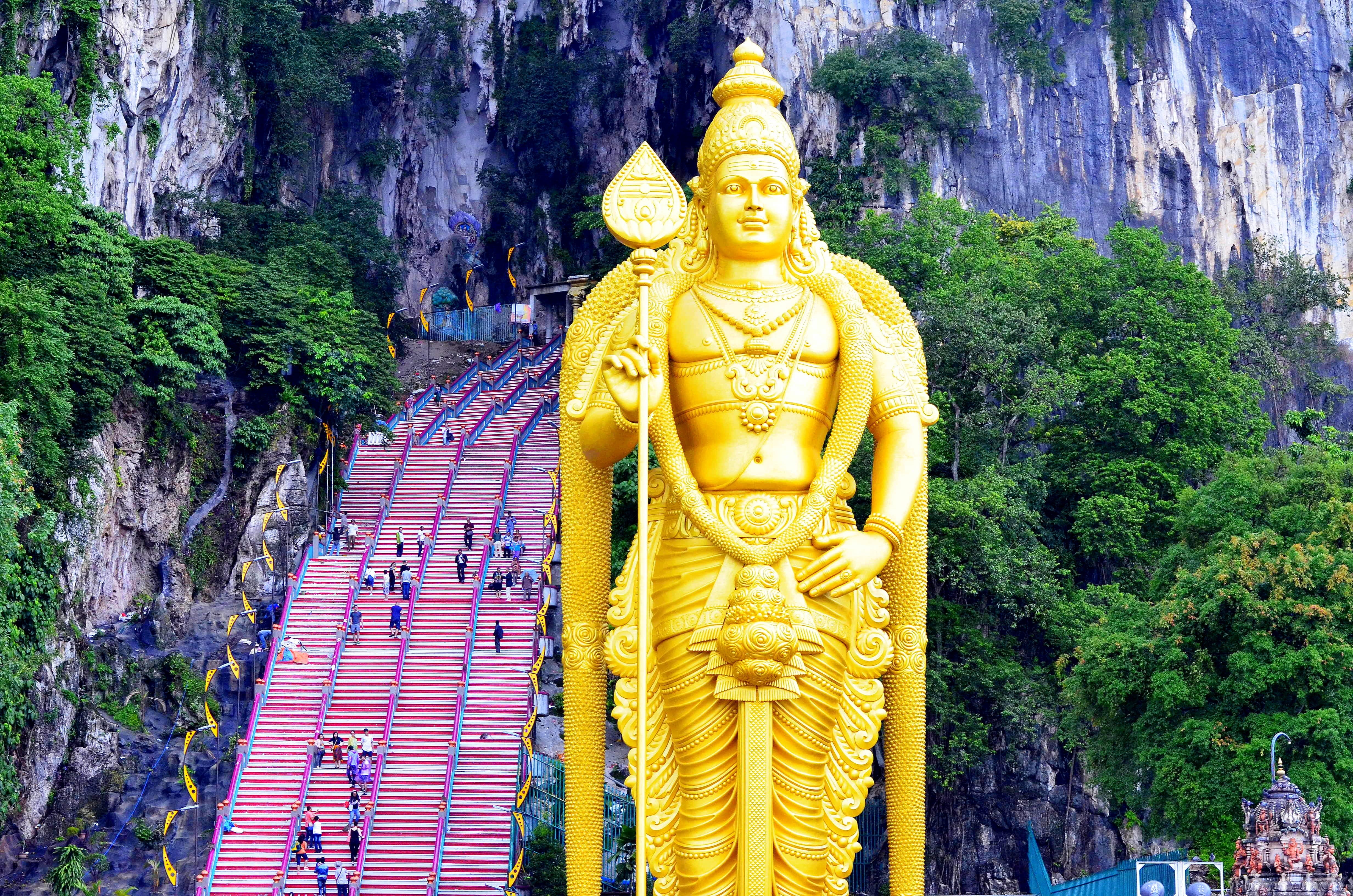 religion, golden, travel, batu caves, worship, kuala lumpur, shrine, plant, sculpture, metropolis, hindu, architecture, tree, male likeness, kuala, place of worship, HD Wallpaper