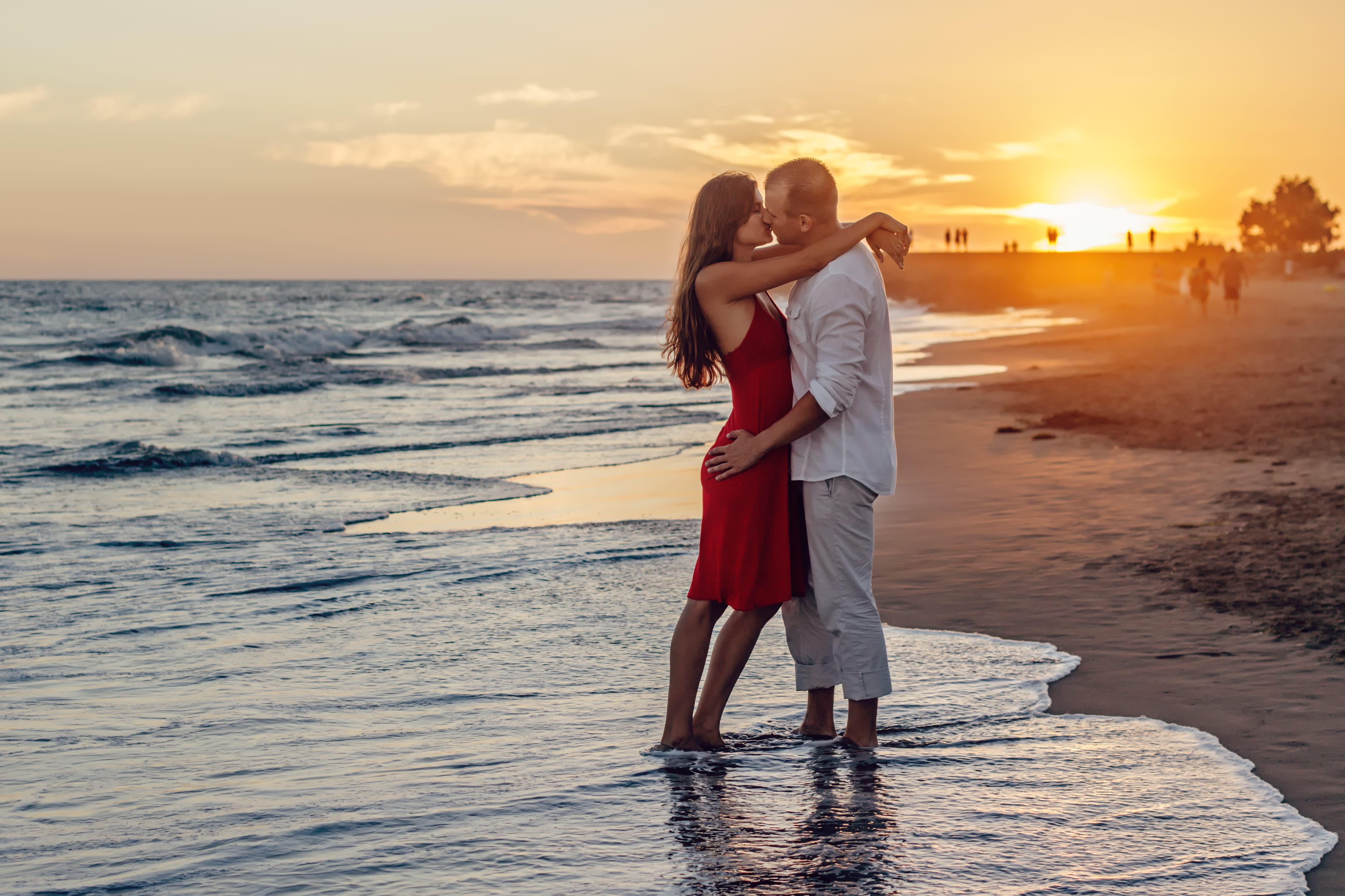people, love, emotion, horizon over water, 5K, golden, ocean, vacation, leisure activity, couple - relationship, sea, red dress, dawn, waves, positive emotion, HD Wallpaper