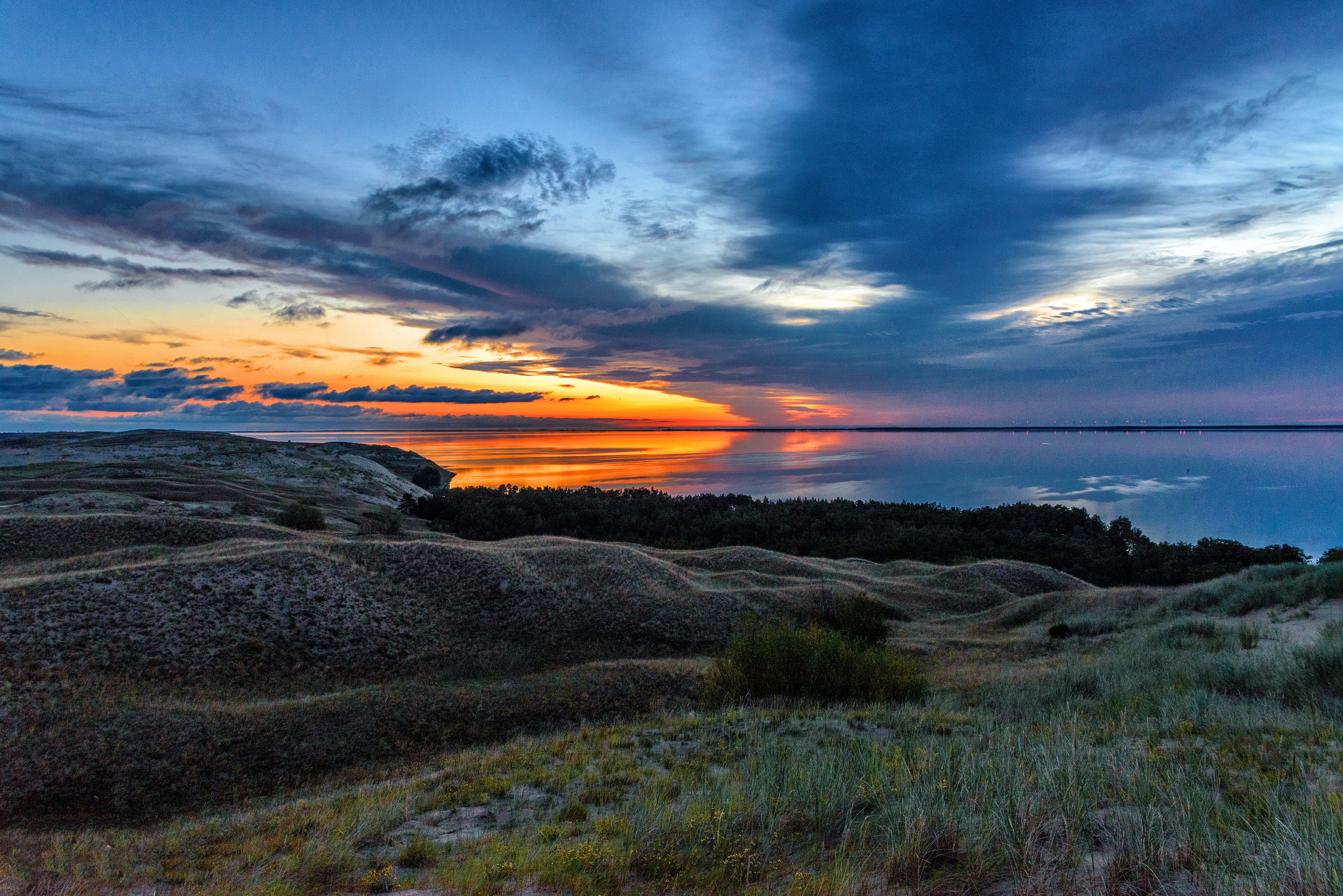 grass, oceanshore, scenic, non-urban scene, oceanside, nature photography, sunrise, tranquility, plant, orange color, idyllic, nature, sunset, water, clouds, HD Wallpaper