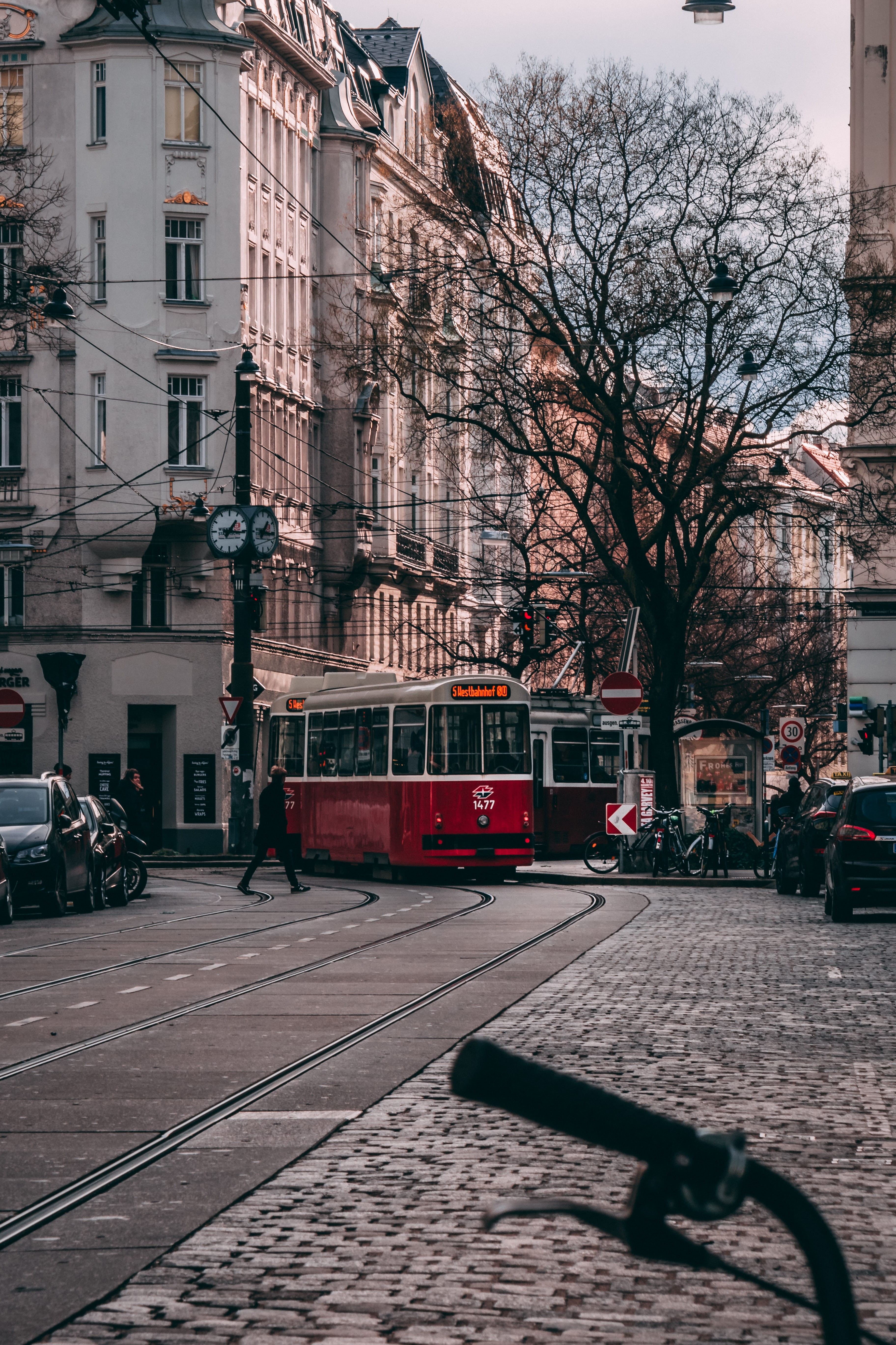 urban, street photo, street photography, built structure, mode of transportation, architecture, bare tree, car, public transportation, winter, sunset, tree, Phone HD Wallpaper