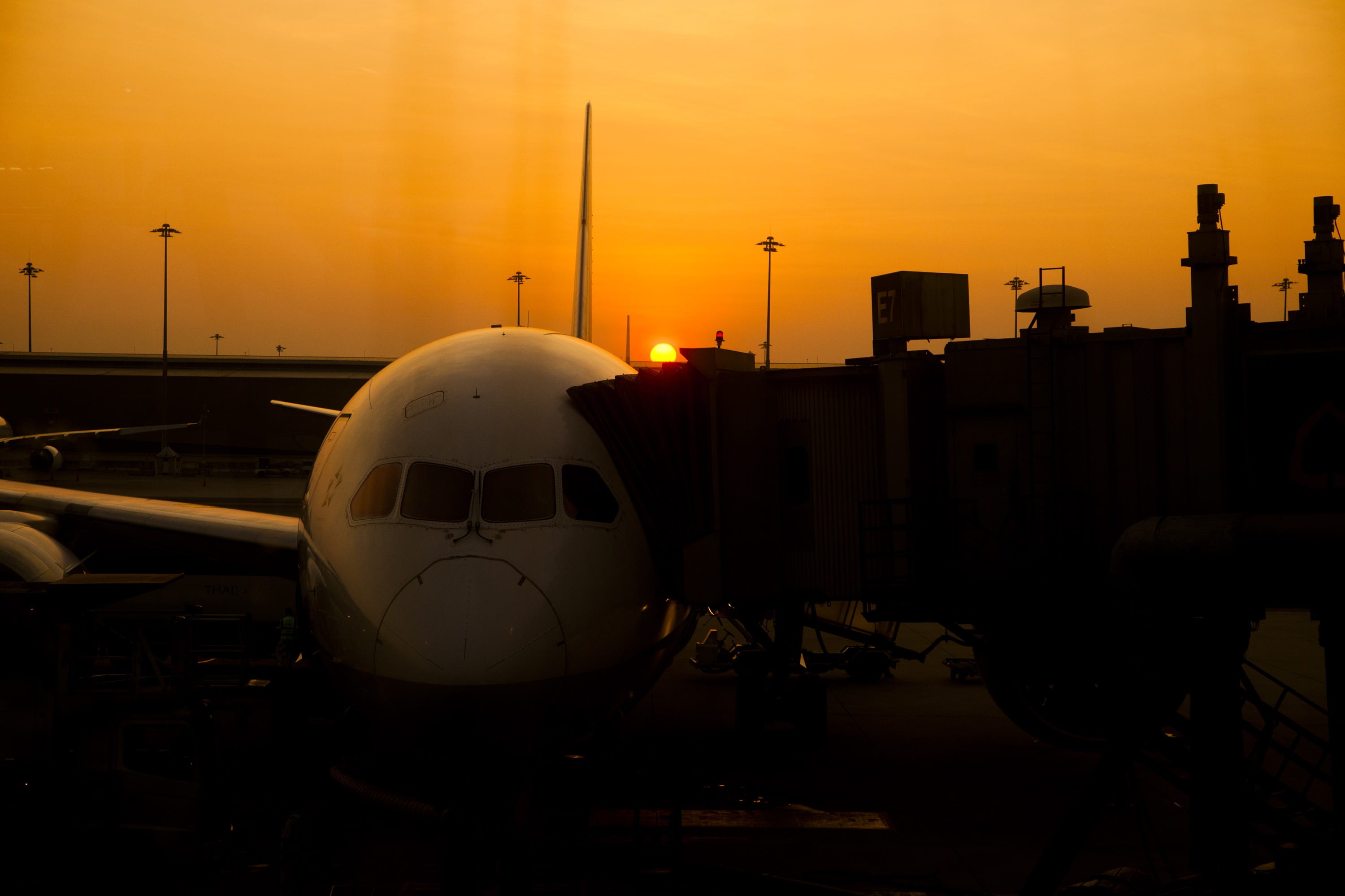 aerospace industry, sun, dawn, airplane, backlit, city, aircraft, airport terminal, dusk, flight, silhouette, passenger boarding bridge, mode of transportation, HD Wallpaper