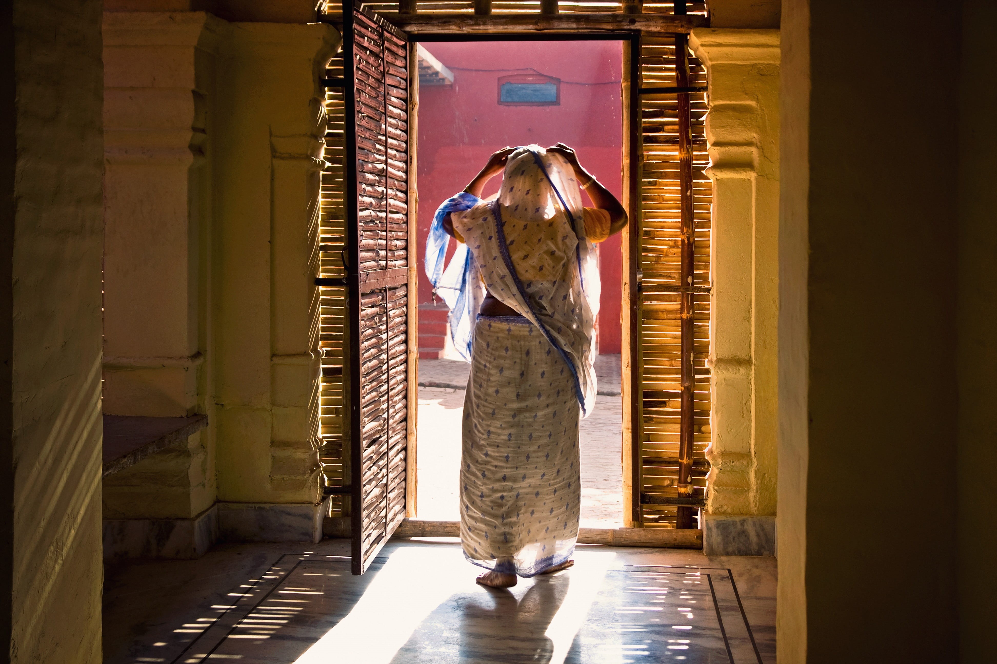 adult, sunlight, day, faith, entrance, full length, looking, light, walk, 4K, travel, hole, indian, vaishnava, real people, doorway, vrindavan, side view, HD Wallpaper