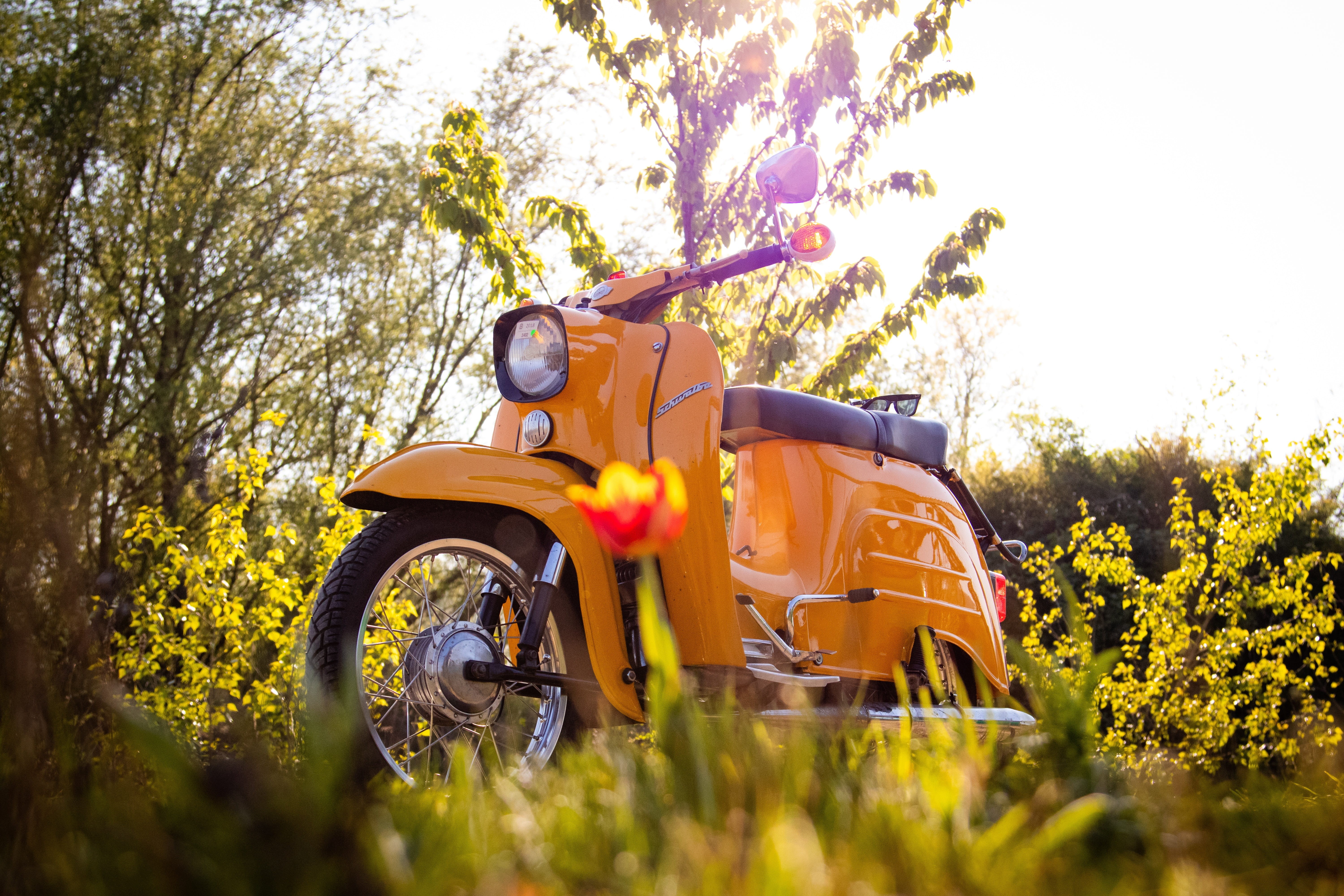 retro styled, wheel, nature, schwalbe, land, meadow, agricultural machinery, outdoors, sunlight, simson, grass, tree, yellow, one person, selective focus, HD Wallpaper