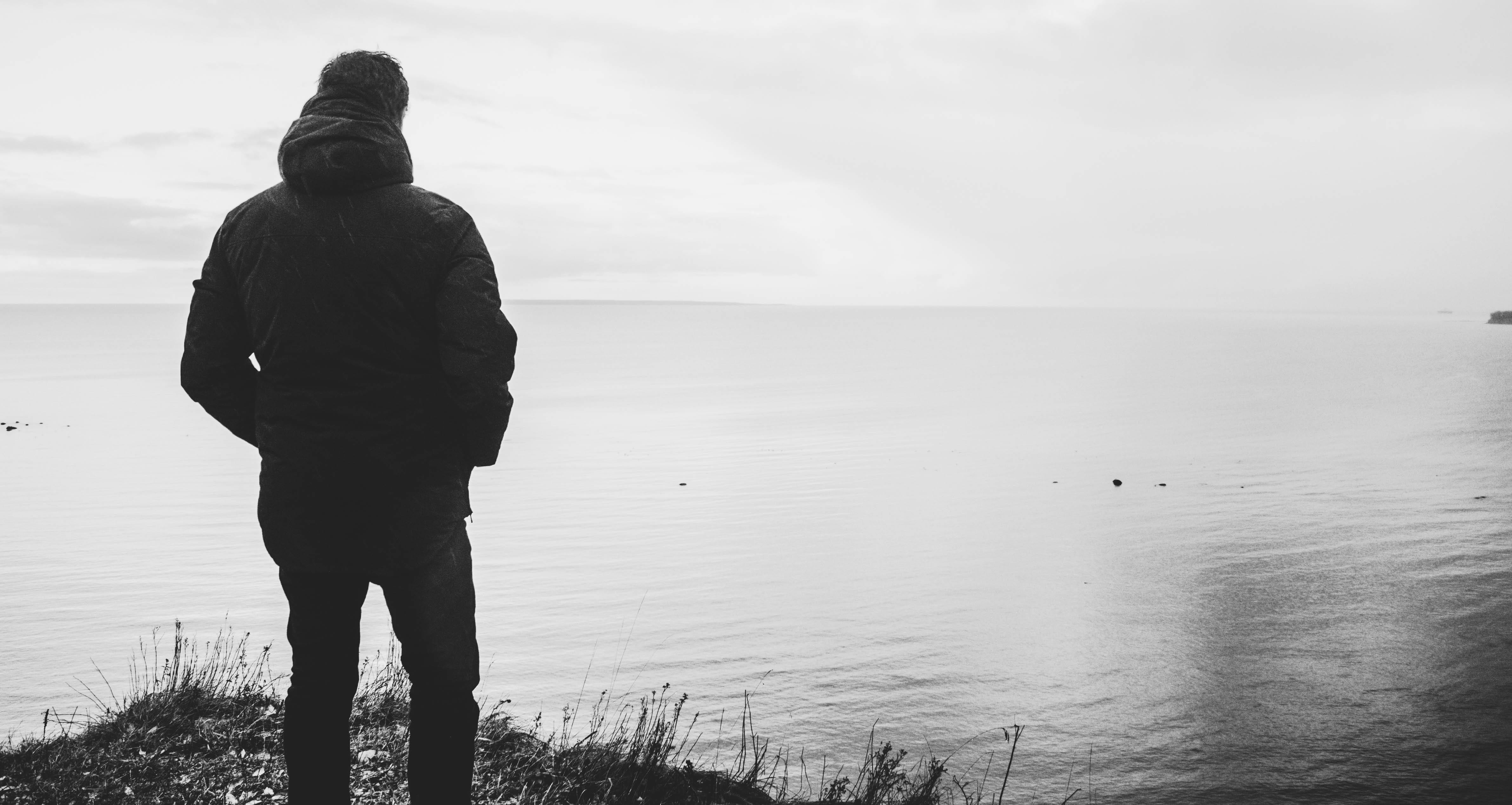 horizon over water, tranquil, seashore, person, silhouette, near, 4K, one person, calm, men, land, contemplation, nature, water, real people, tranquil scene, HD Wallpaper