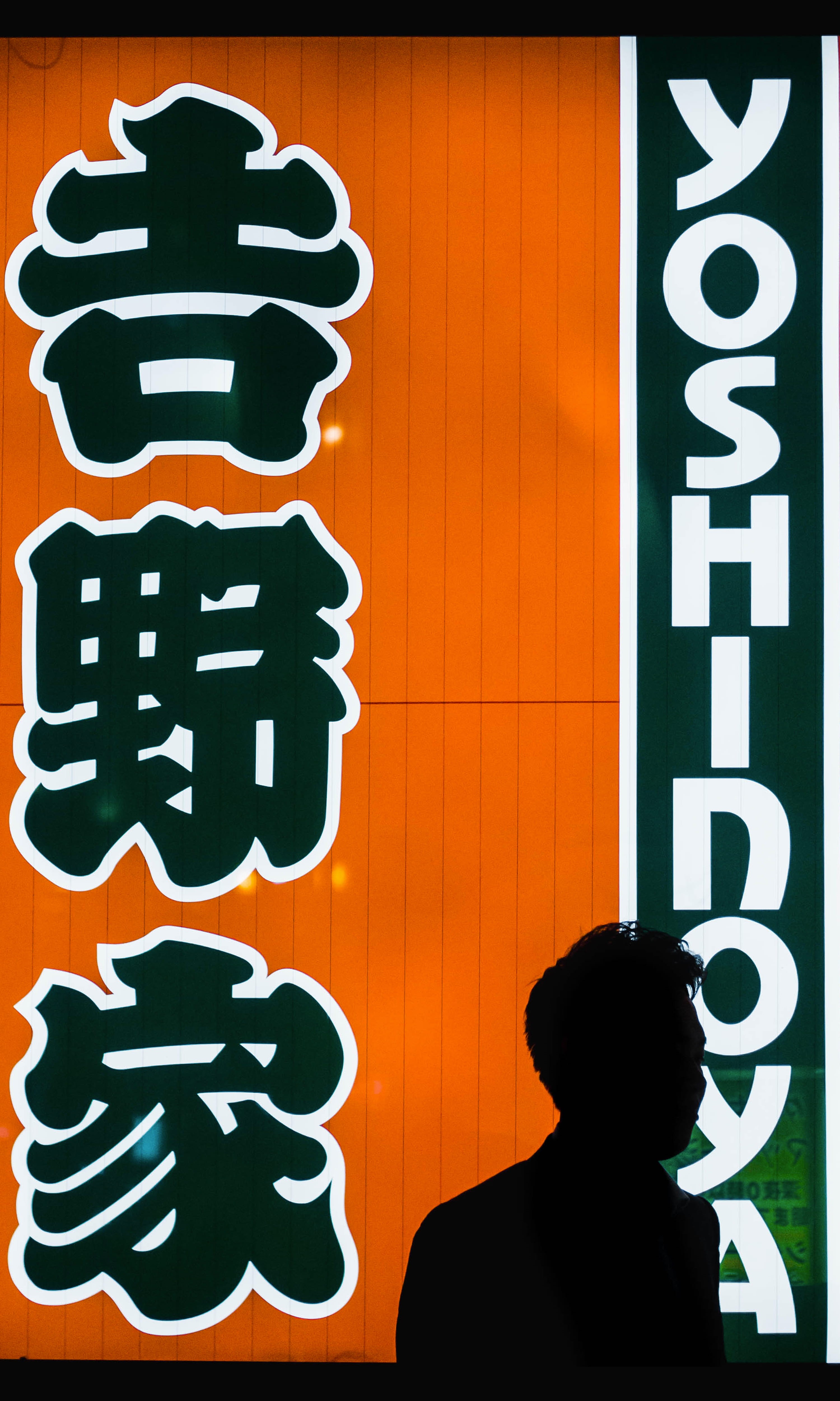 person, night, silhouette, communication, text, japan, representation, kanji, art and craft, outdoors, store, 4K, orange, western script, one person, near, Phone HD Wallpaper