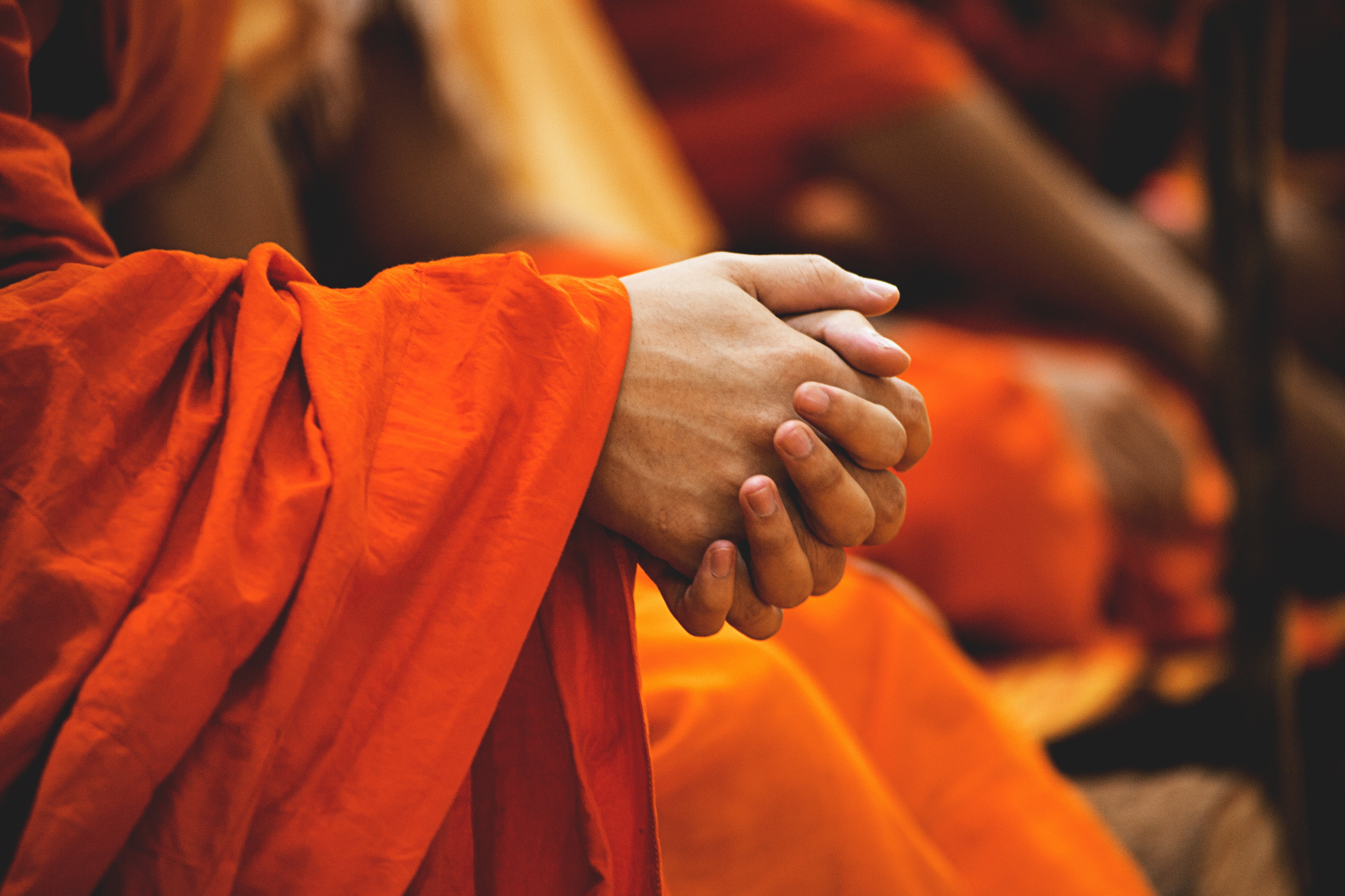 orange color, buddhism, robe, social issues, human body part, belief, praying, traditional clothing, hands, 5K, spirituality, human, place of worship, HD Wallpaper