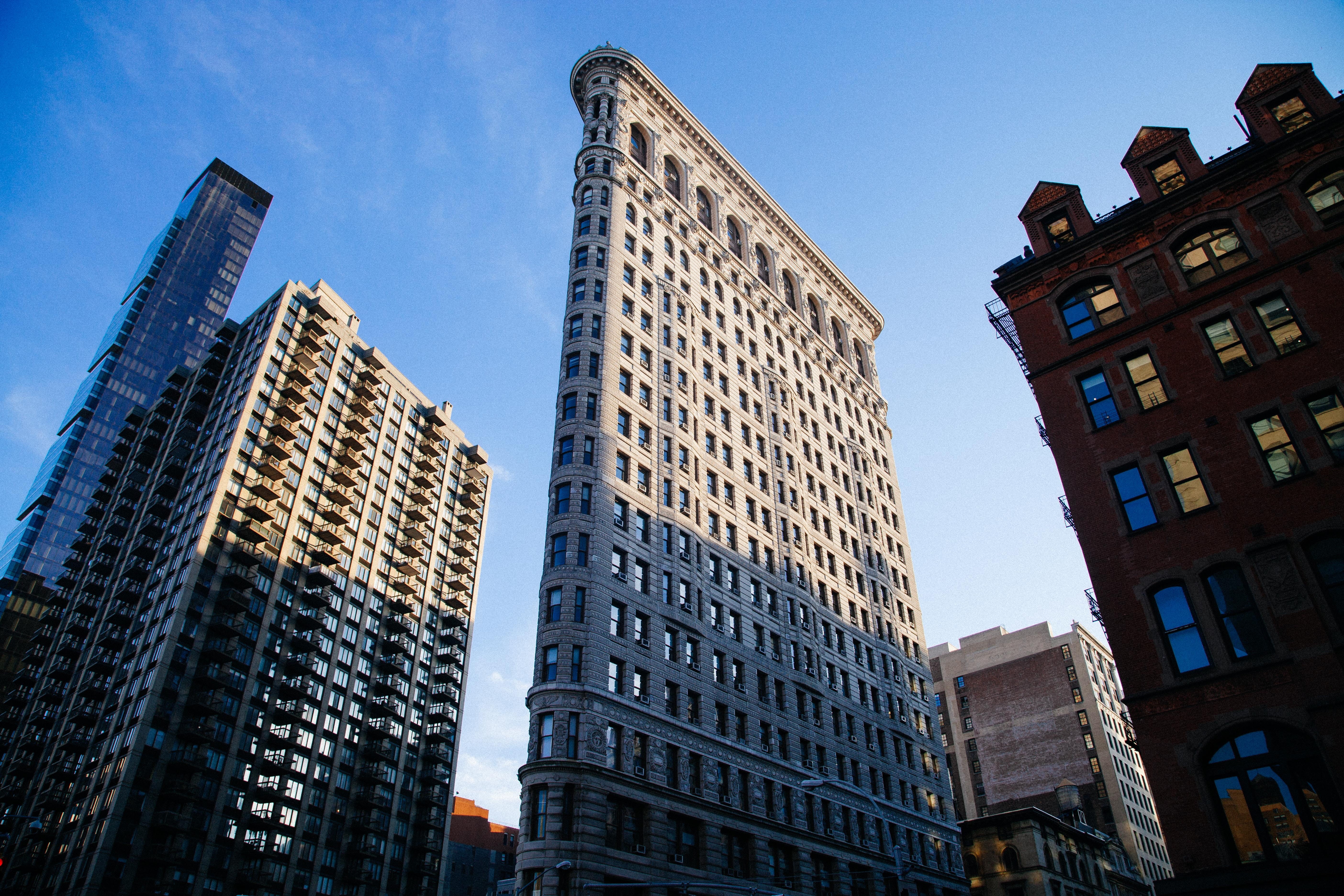 buildings, building, background, low angle view, sky, architecture, blue, outdoors, landmark, brown, clear sky, financial District, uSA, blue sky, low, HD Wallpaper