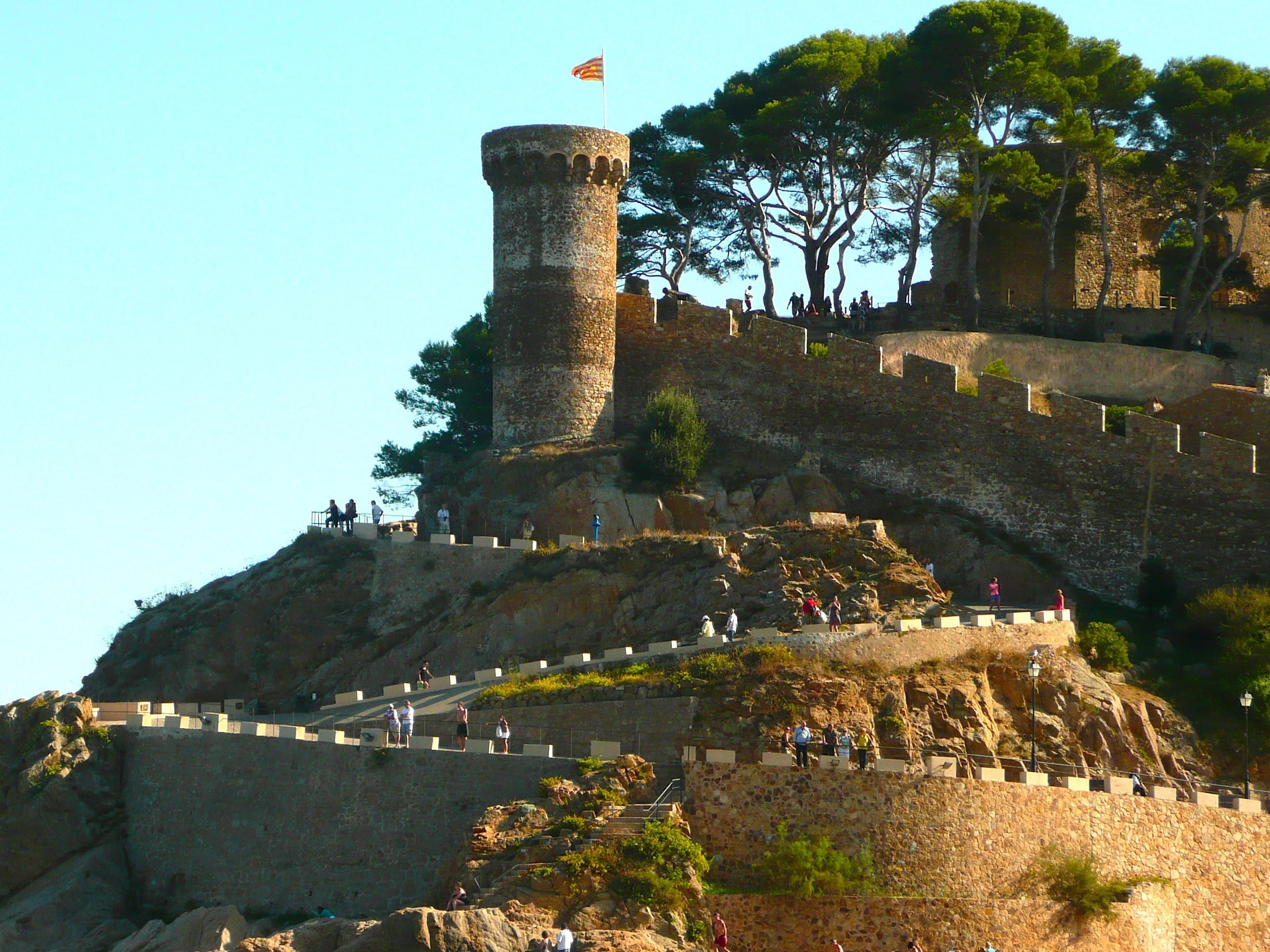 nature, tourism, buildings, clear sky, near, clouds, built structure, spain, scenic, blue, spring, day, tossa de mar, tree, archaeology, travel destinations, HD Wallpaper