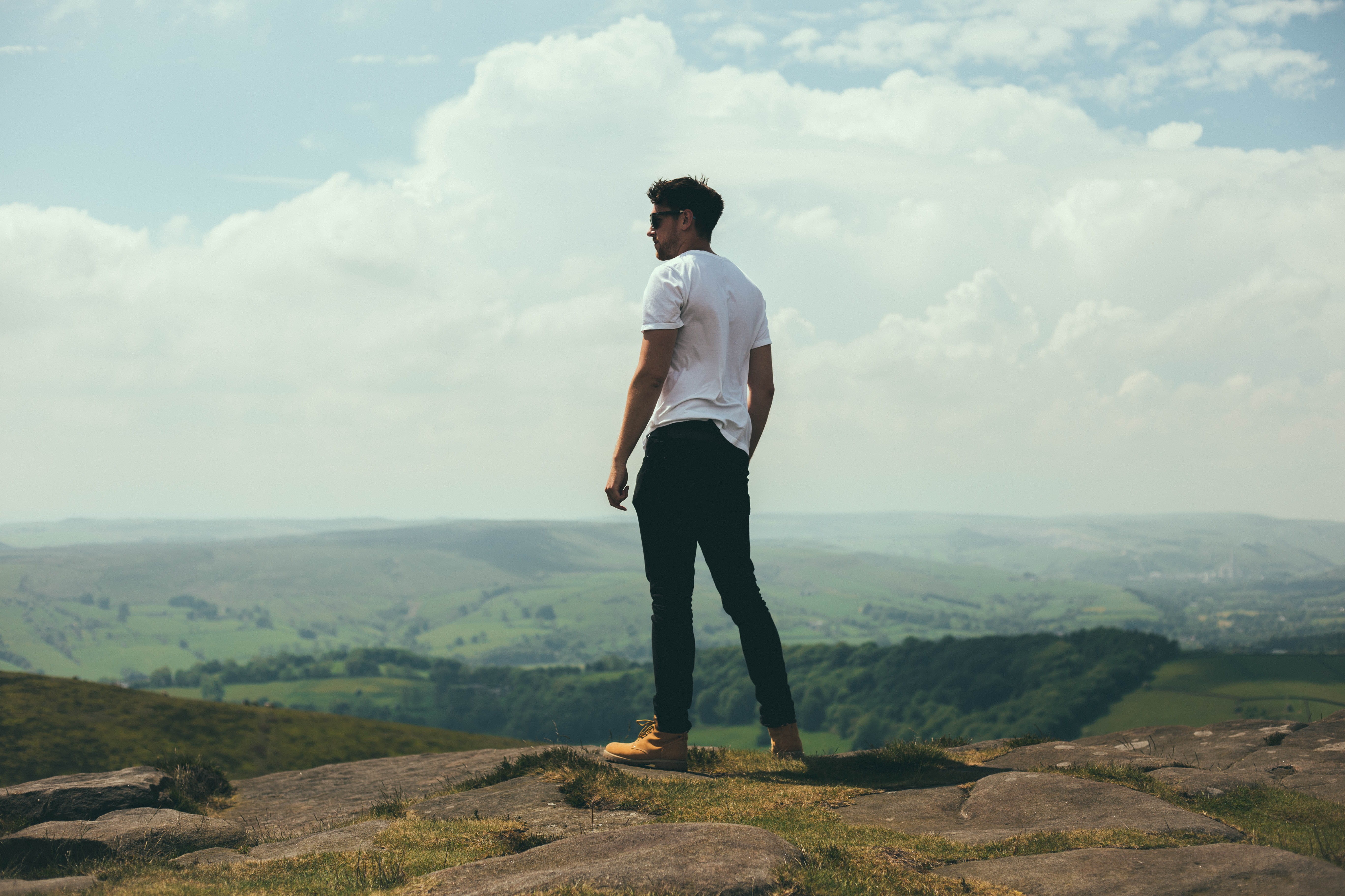 person, white, males, landscape, man, cloud - sky, looking, bolder, standing, mountain, one Person, one Man Only, only Men, cliff, mountains, white shirt, HD Wallpaper