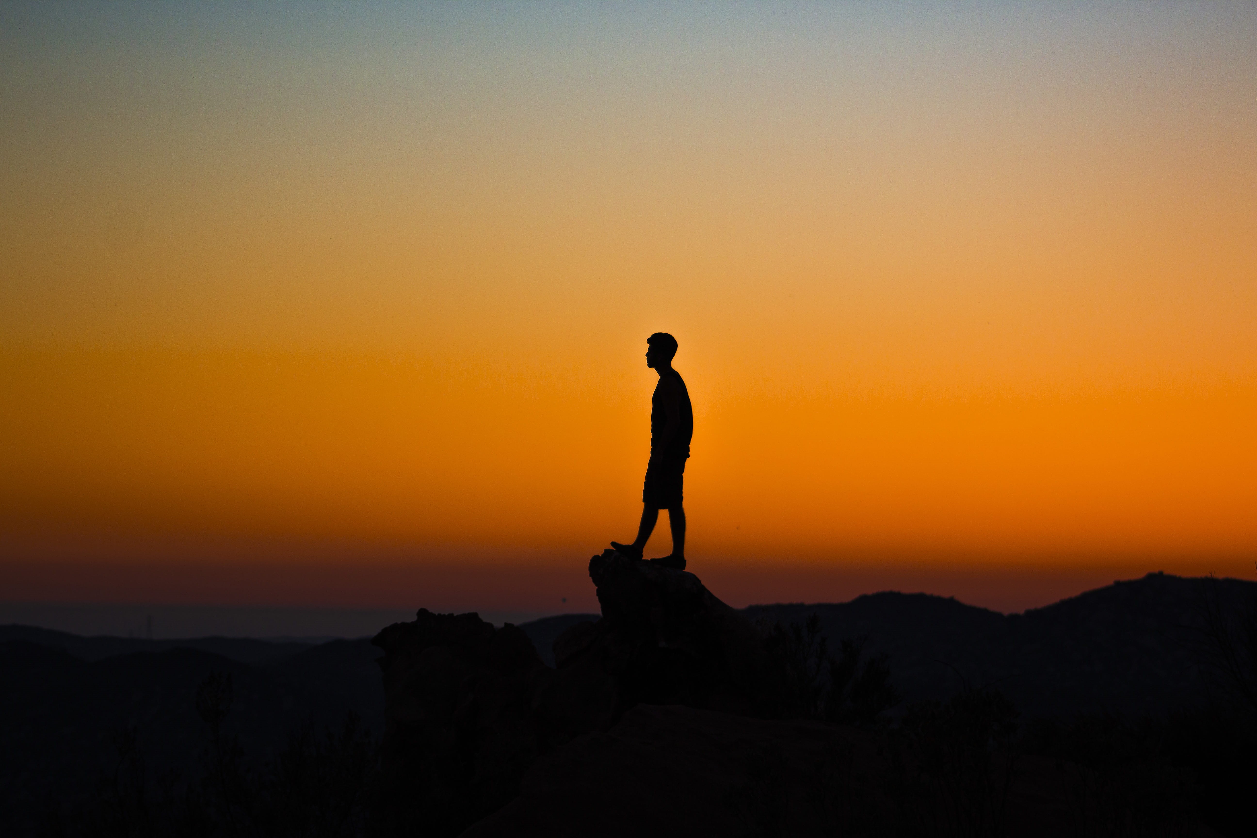 outdoors, beauty in nature, tranquility, full length, mountain, sunset, lifestyles, one man only, sport, cliff, copy space, Barona, tranquil scene, leisure activity, HD Wallpaper