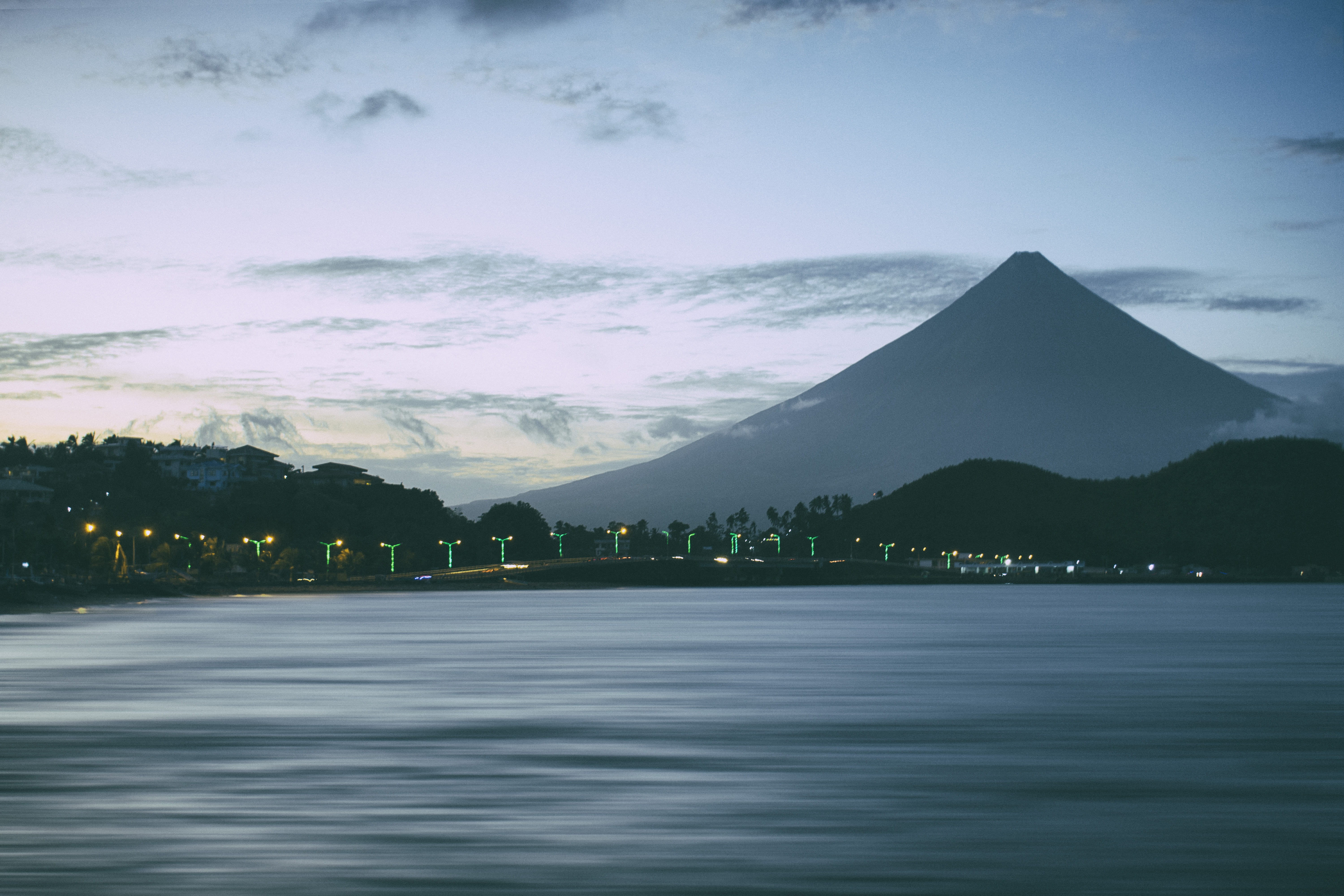 built structure, plant, mountain, water, landscape, sky, architecture, outdoors, dusk, travel destinations, Mayon Volcano, mountain peak, scenics - nature, HD Wallpaper