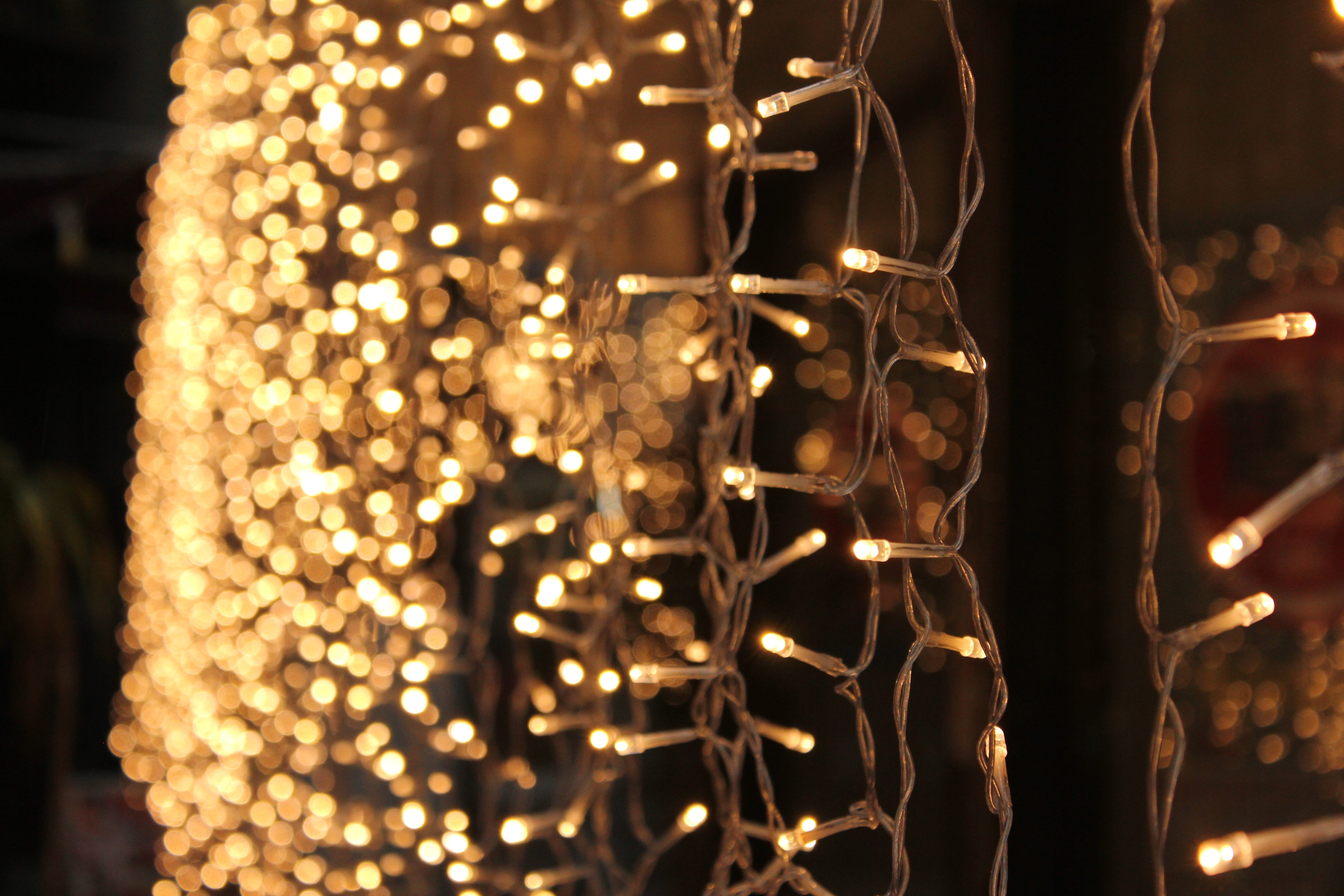 gold colored, retail, wealth, glowing, light effects, night, year, 5K, black background, string, colorful, hanging, christmas, holiday, no people, decoration, HD Wallpaper