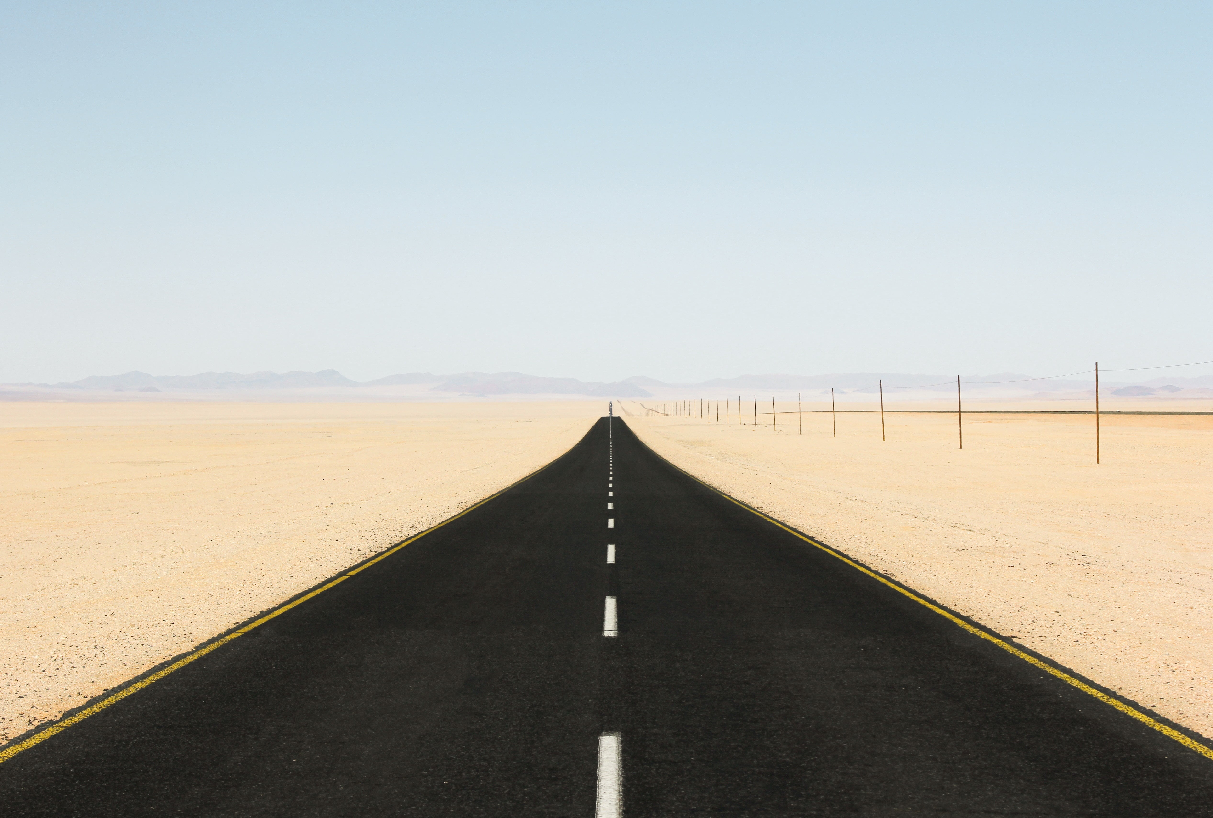 sand, table, clear sky, horizon, dividing line, sign, mountains, diminishing perspective, scenics - nature, transportation, black, environment, road, white, HD Wallpaper