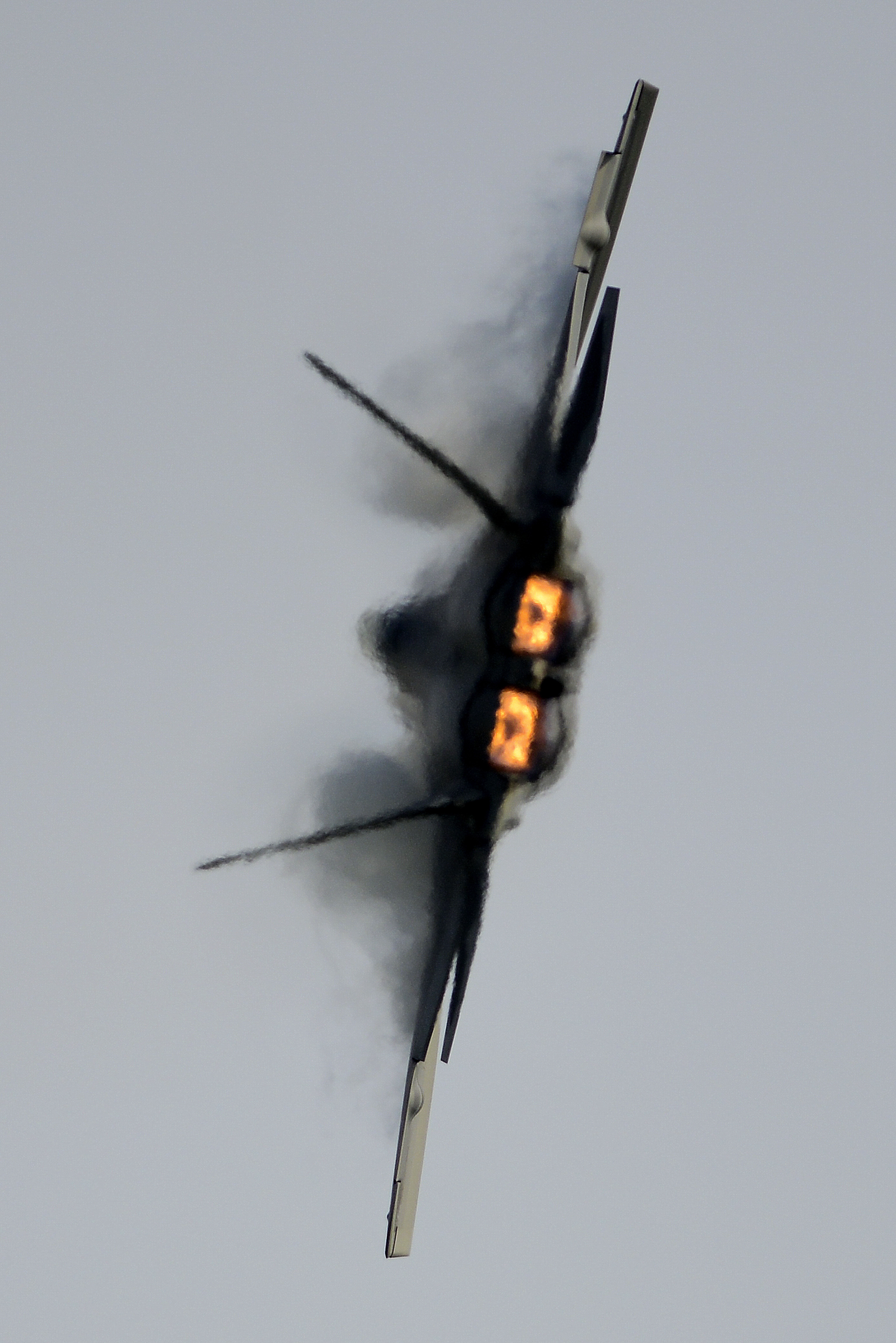 weapon, indoors, close-up, flame, aircraft, no people, fire - natural phenomenon, burning, military, motion, airplane, aggression, Lockheed Martin F-22 Raptor, Phone HD Wallpaper
