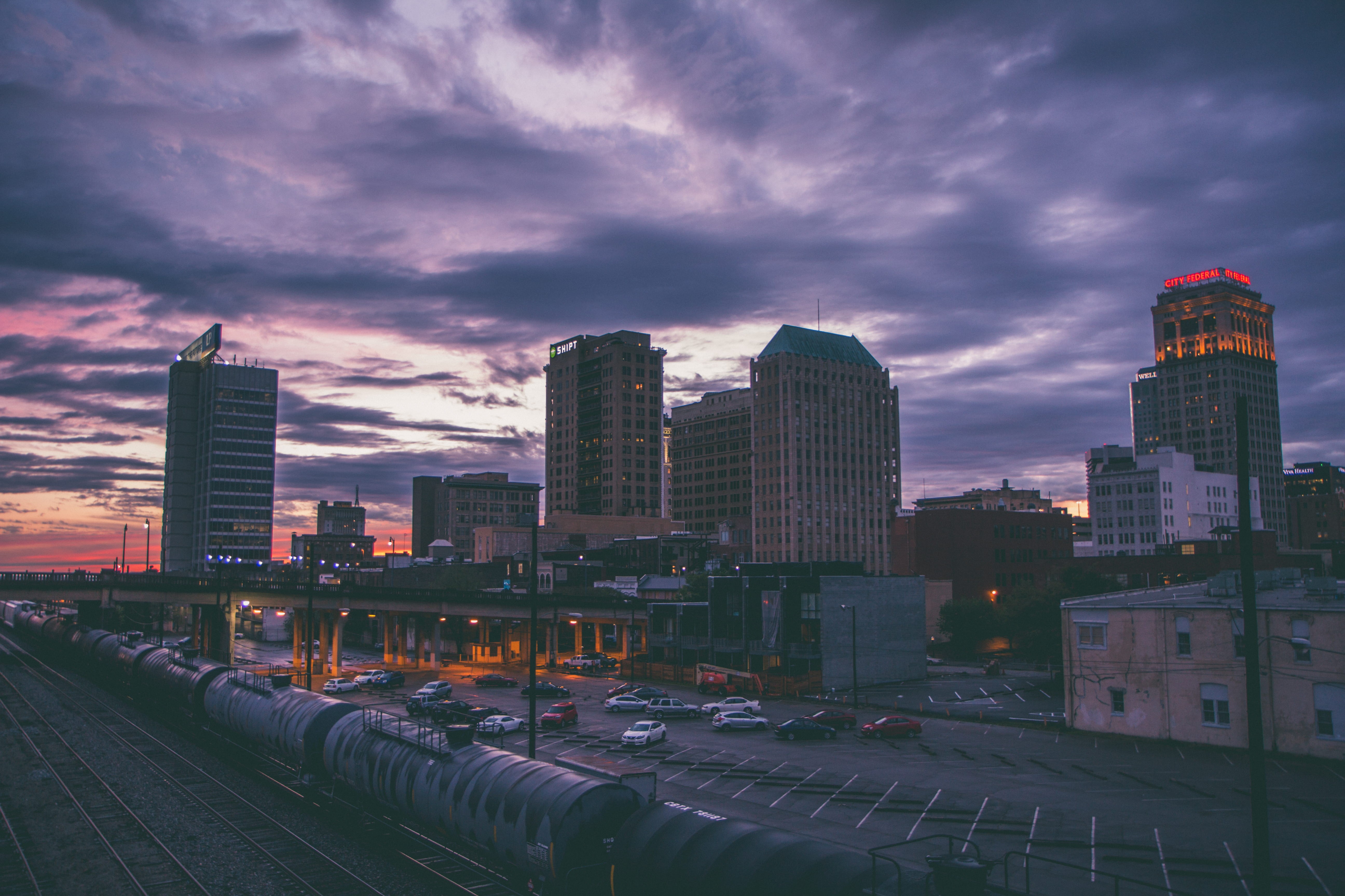 cars, south, office building exterior, cloud - sky, southeast, modern, birmingham, dark, s, skyline, outdoors, skyscraper, lot, railyard, nature, built structure, HD Wallpaper