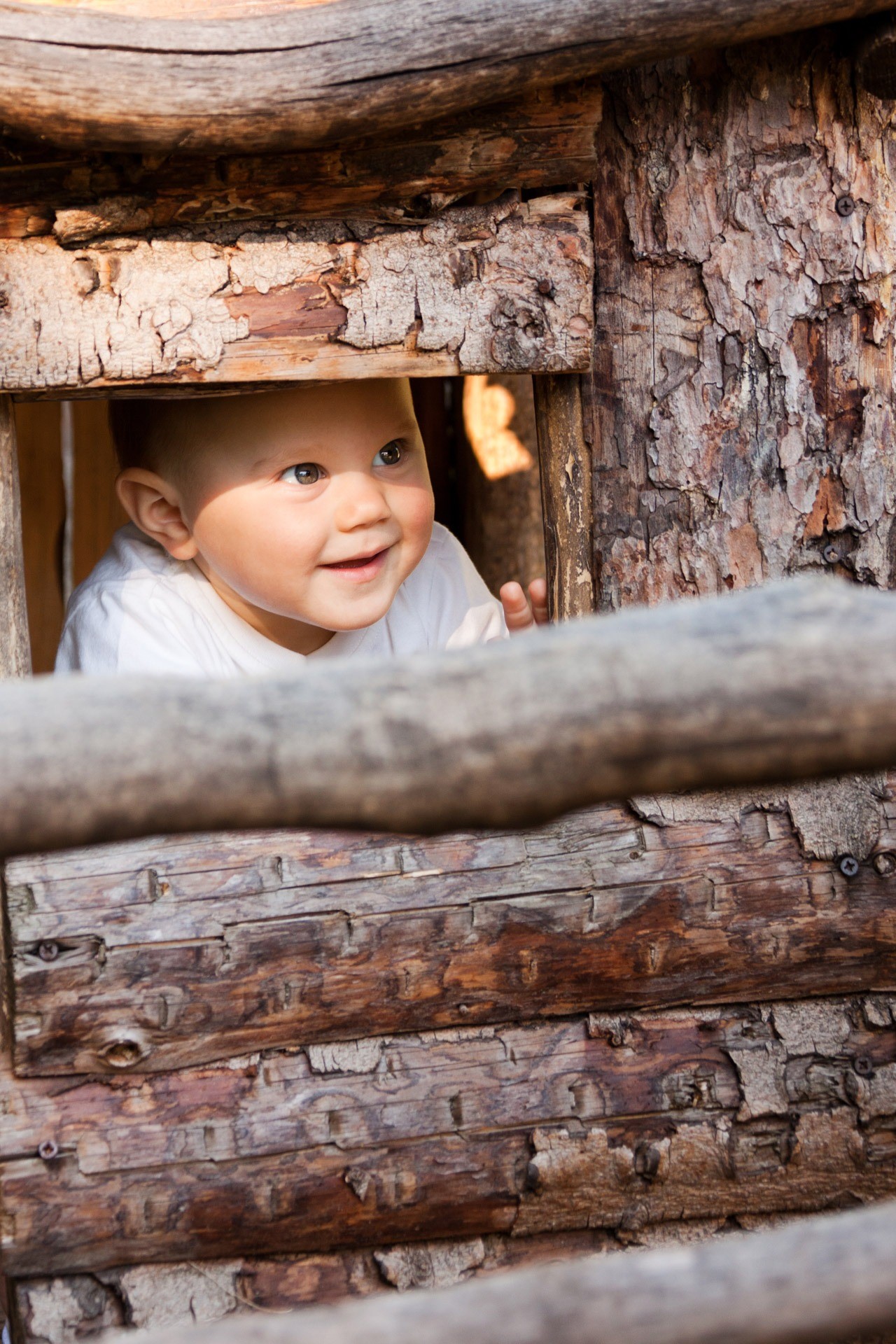 kid, child, peekaboo, smile, real people, day, wood - Material, one Person, boys, outdoors, peeping, portrait, baby, person, caucasian Ethnicity, cute, Phone HD Wallpaper
