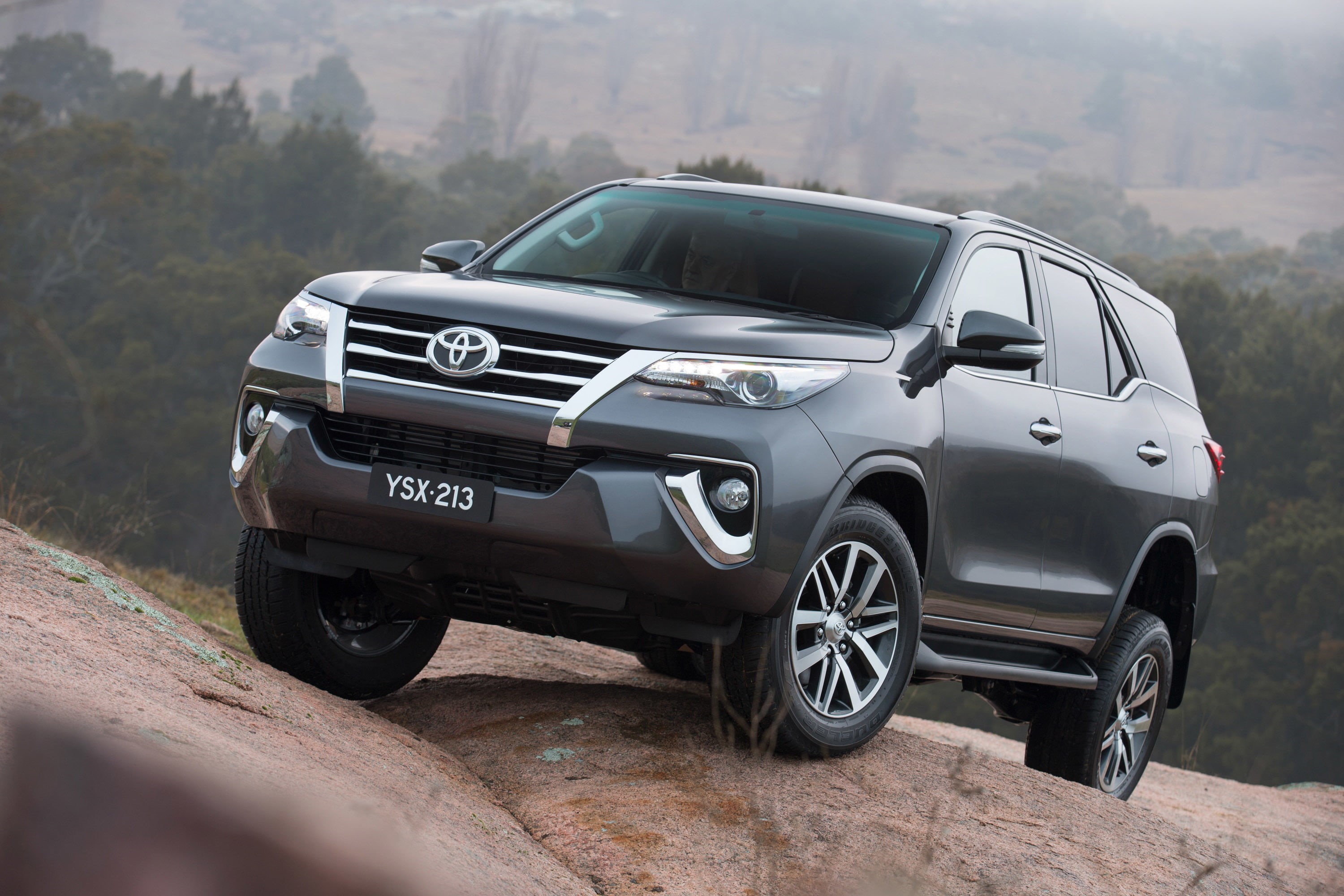 stationary, Toyota, no people, Fortuner, outdoors, mode of transportation, motor vehicle, luxury, suv, day, land vehicle, land, 2K, transportation, mountain, HD Wallpaper