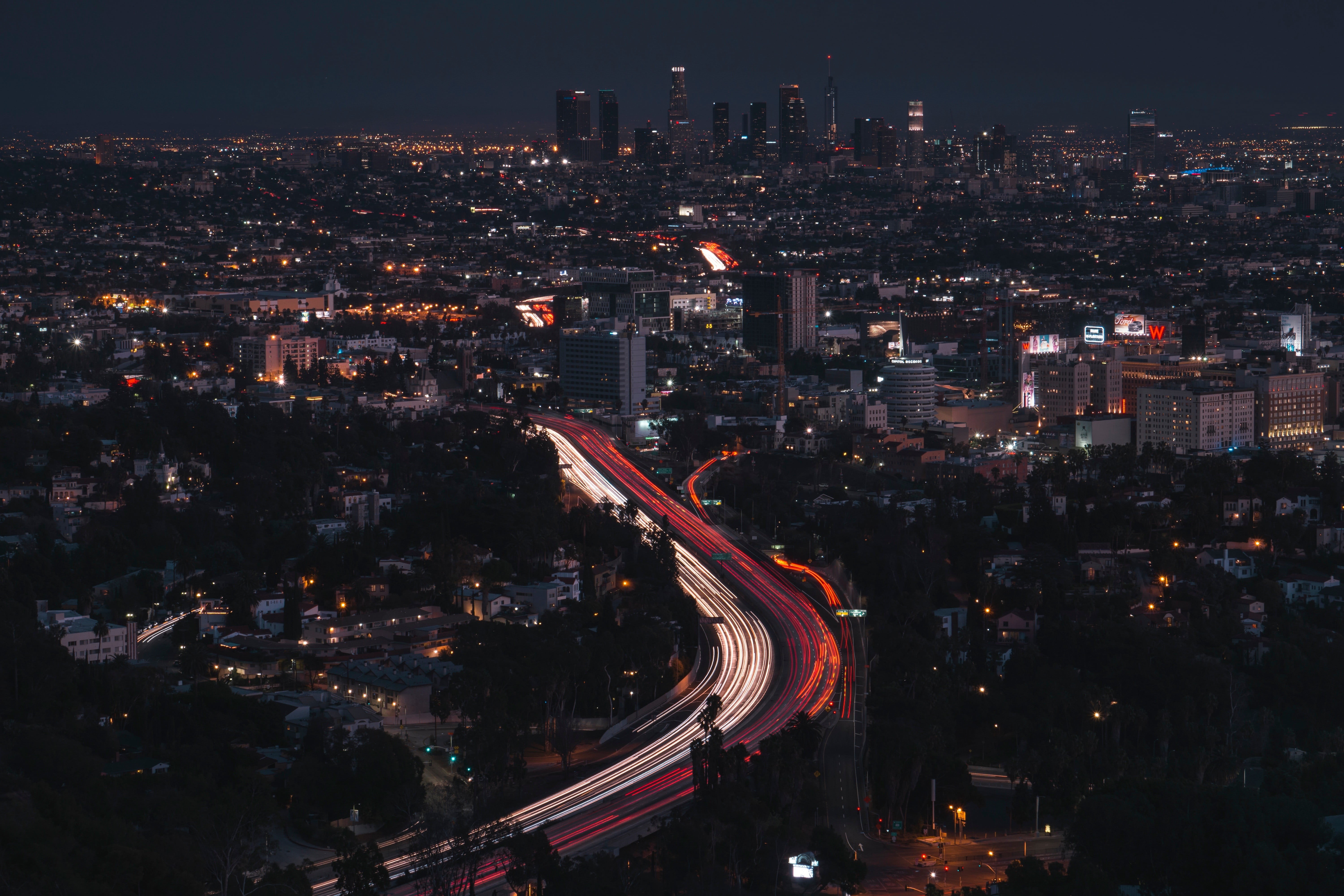 transportation, lights, night, modern, long exposure, building exterior, light trails, road, skyscraper, multiple lane highway, illuminated, building, city life, HD Wallpaper