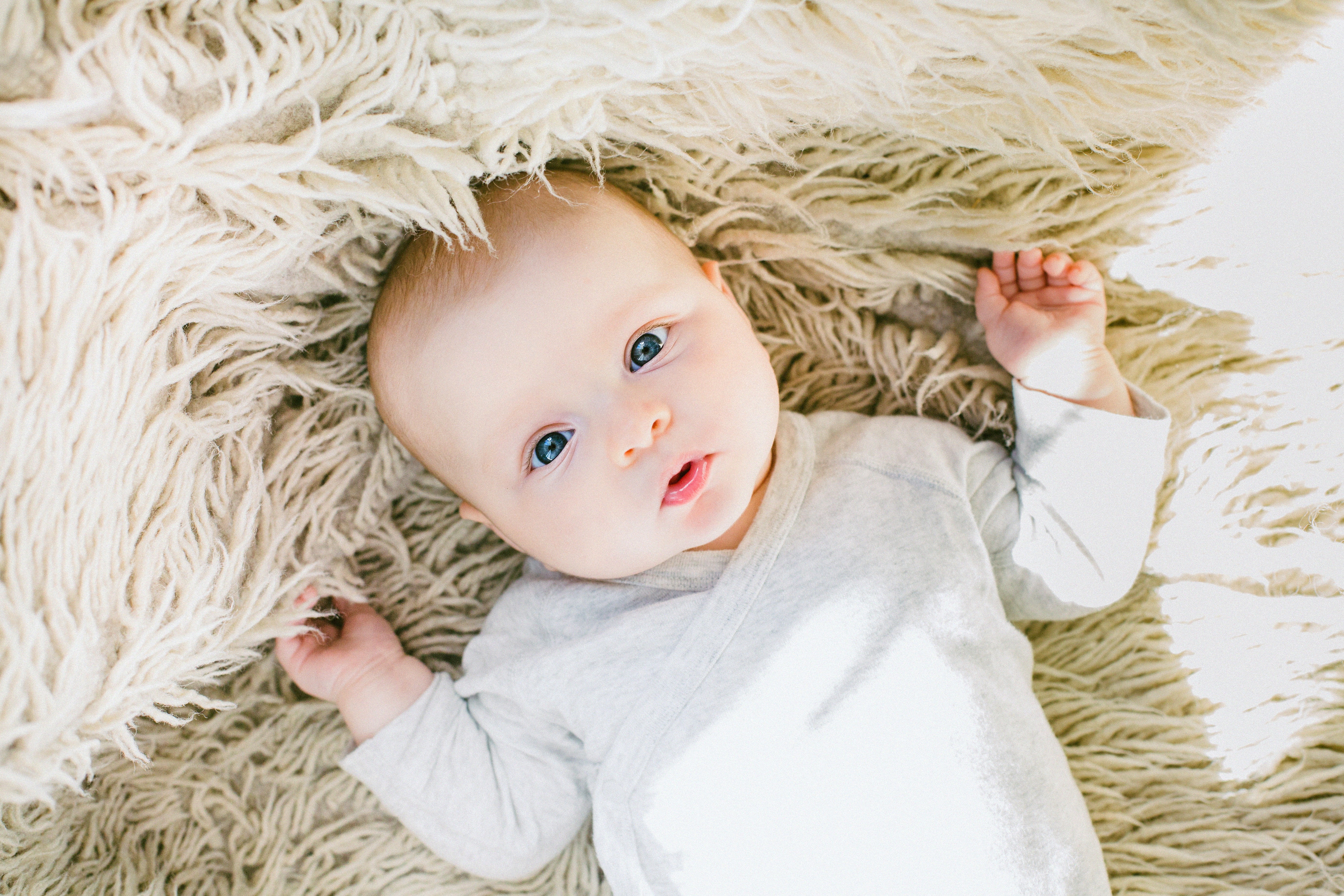 looking, child, eyes, bed, indoors, little, one person, hair, young, babyhood, person, lying down, high angle view, fur, white, childhood, infant, lying on back, HD Wallpaper