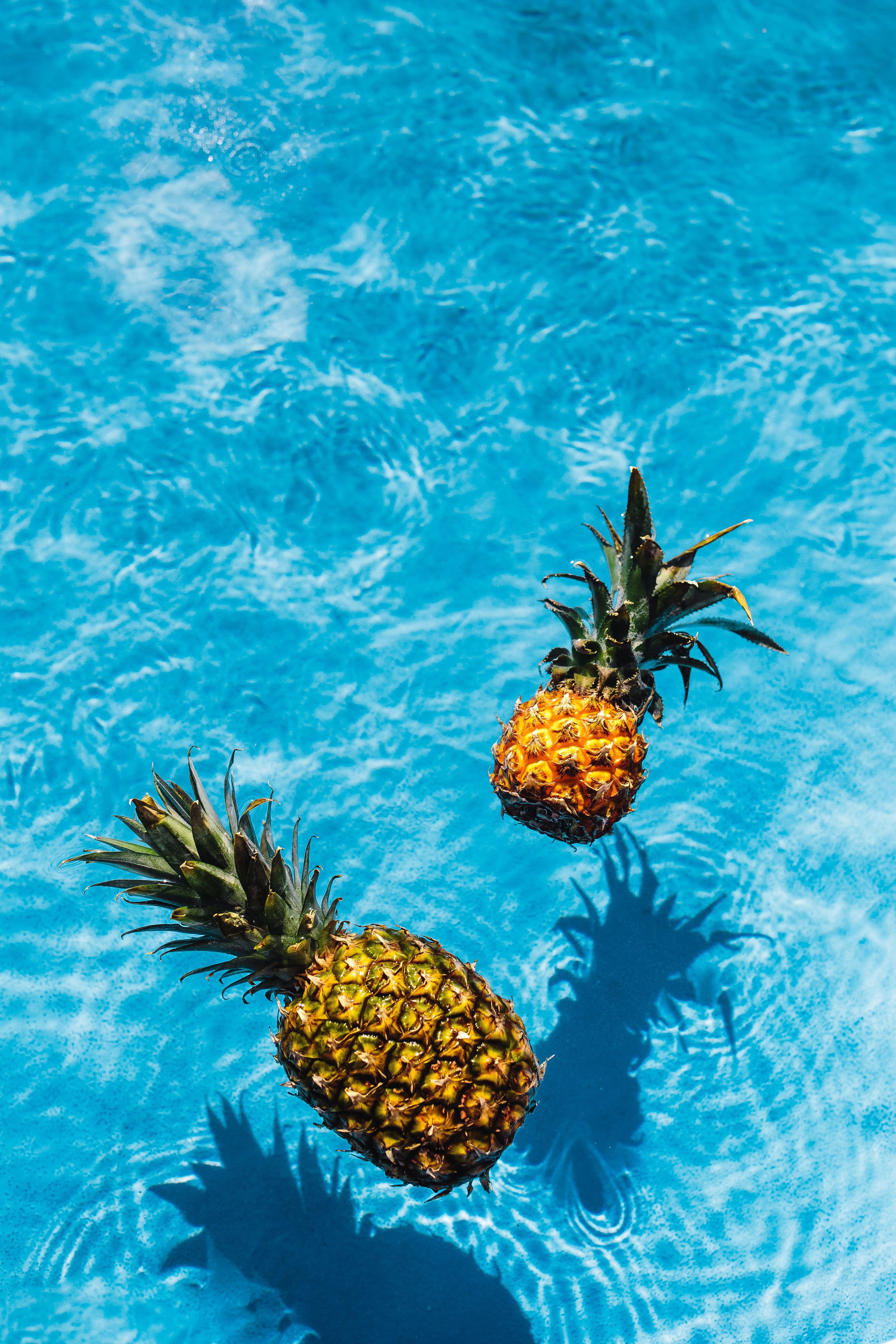 turquoise colored, floating, 5K, waterfront, top view, tropical, water, plant, fresh, high angle view, pineapples, tropical fruit, swimming pool, pineapple, Phone HD Wallpaper