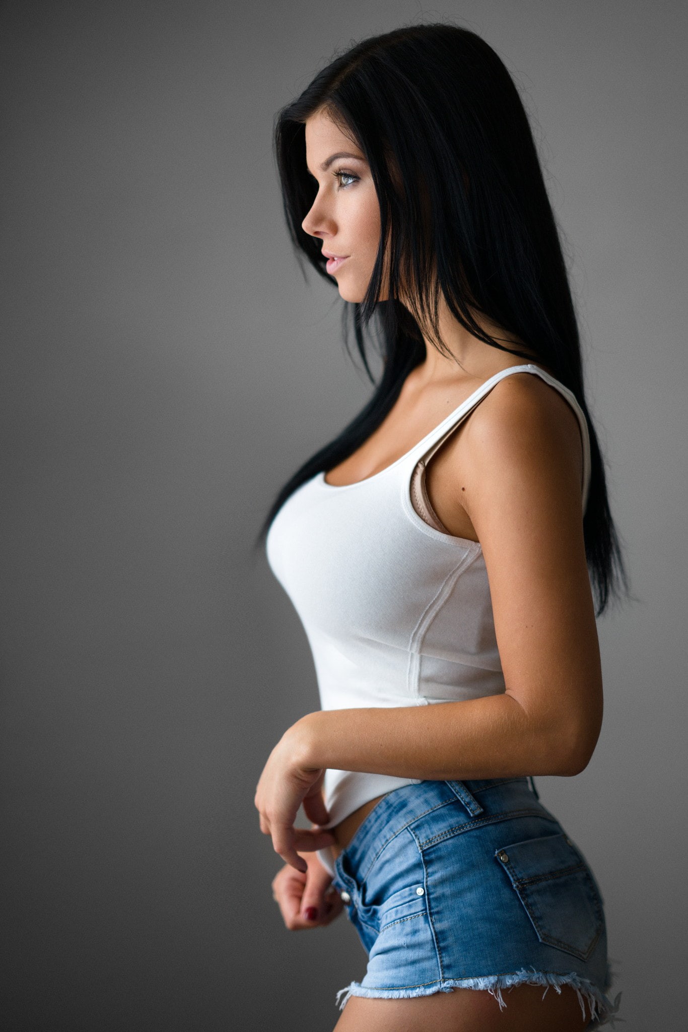 Tereza Polášková, gray, women, side view, jeans, standing, gray background, 1080P, young adult, human body part, black hair, dark hair, simple background, Phone HD Wallpaper