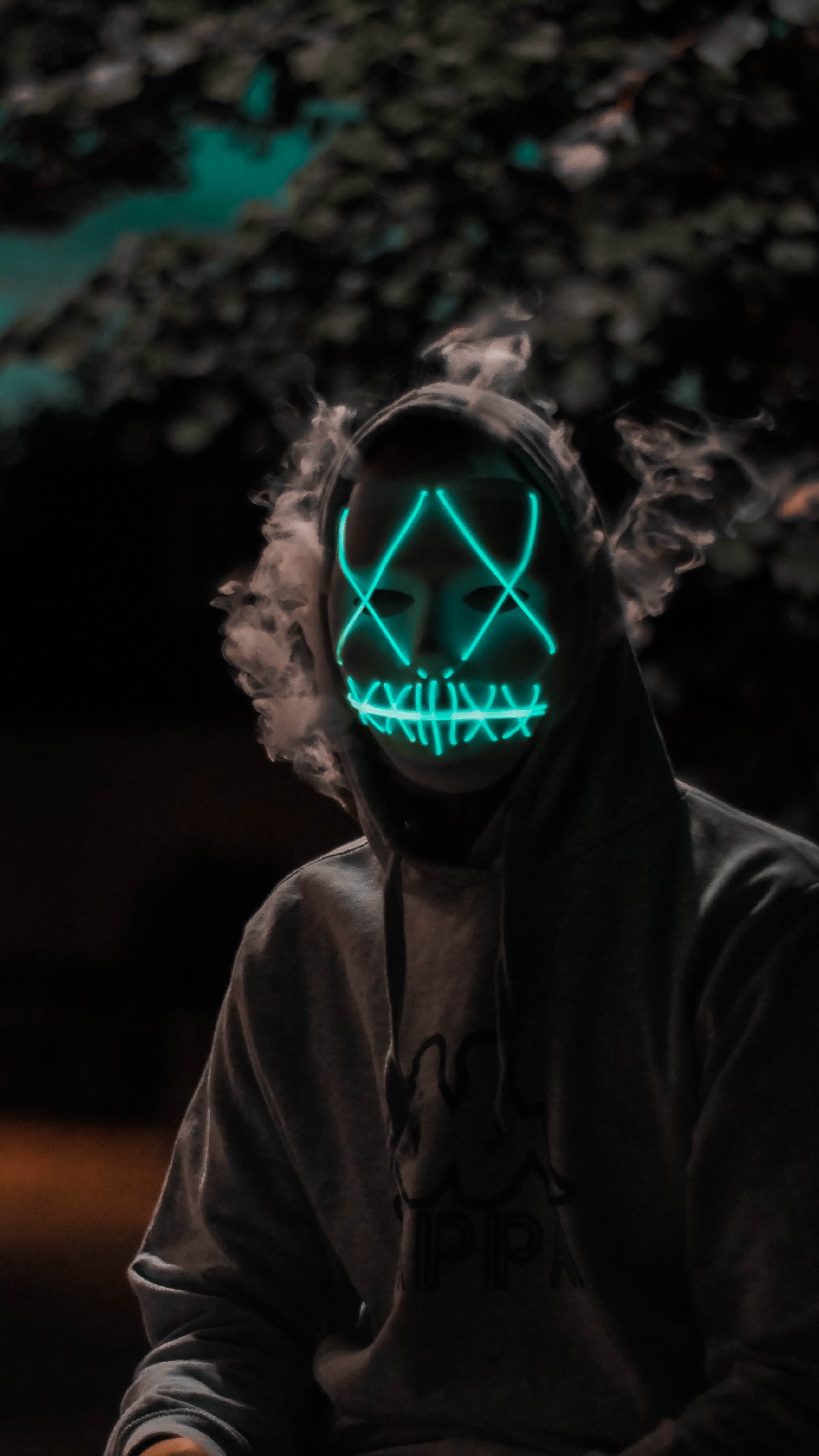 human, standing, leisure activity, surreal, illuminated, 4K, real people, men, hooded shirt, smoke - physical structure, halloween, face, head, eyes, young men, Phone HD Wallpaper