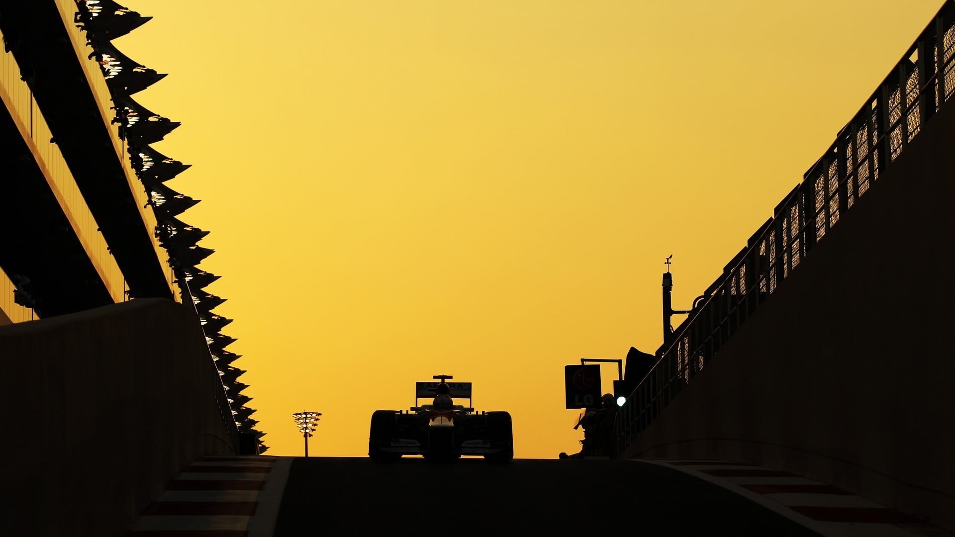 race tracks, sports, Abu Dhabi, industry, clear sky, no people, residential district, vehicle, copy space, silhouette, sunset, building exterior, city, HD Wallpaper