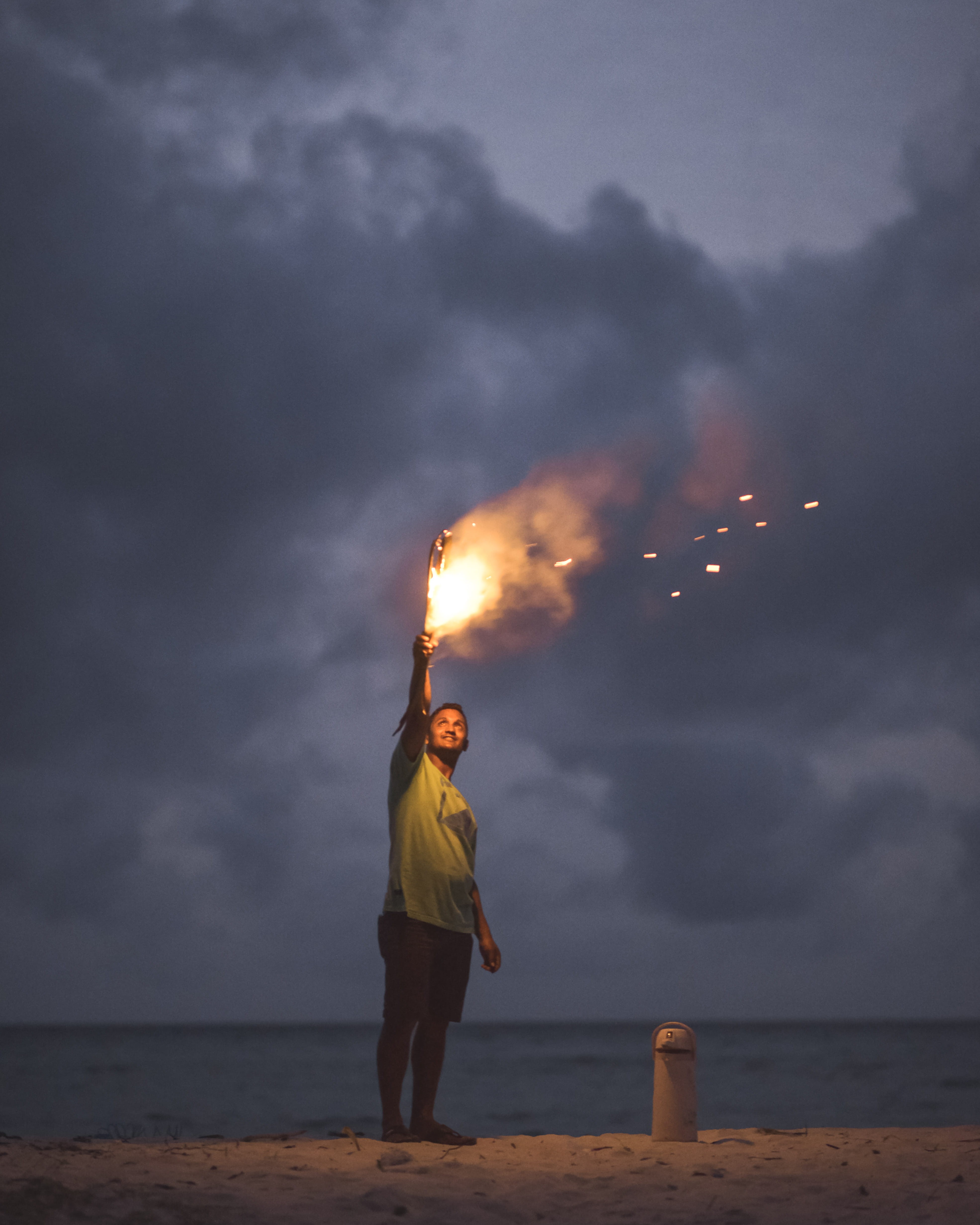 4K, casual clothing, horizon, horizon over water, outdoors, flame, real people, full length, camping, one person, standing, coast, evening, fun, white, Phone HD Wallpaper