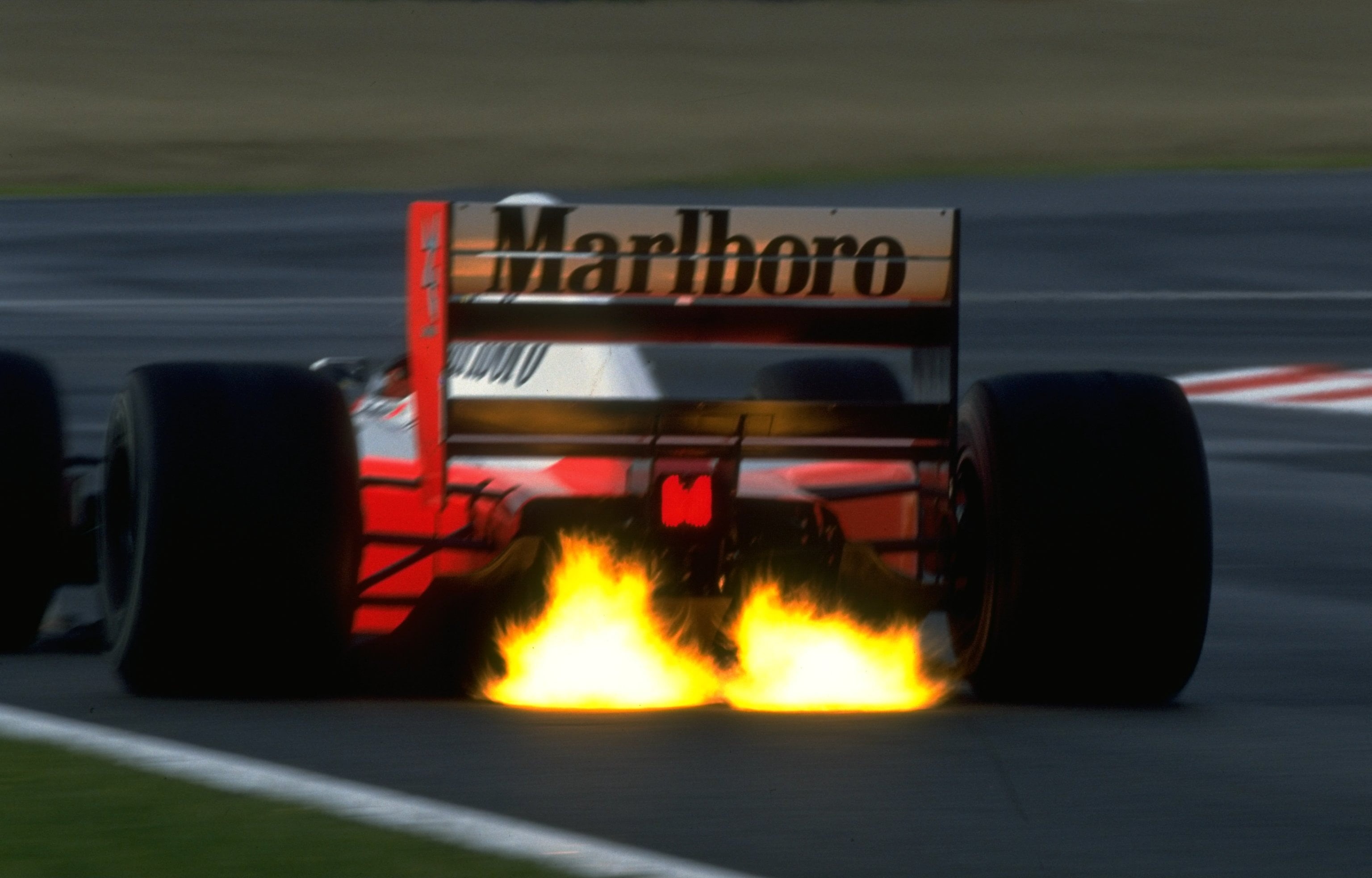 racing, Formula 1, sports, mode of transportation, sign, 2K, nature, outdoors, fire, vehicle, text, transportation, motion, fire - natural phenomenon, HD Wallpaper