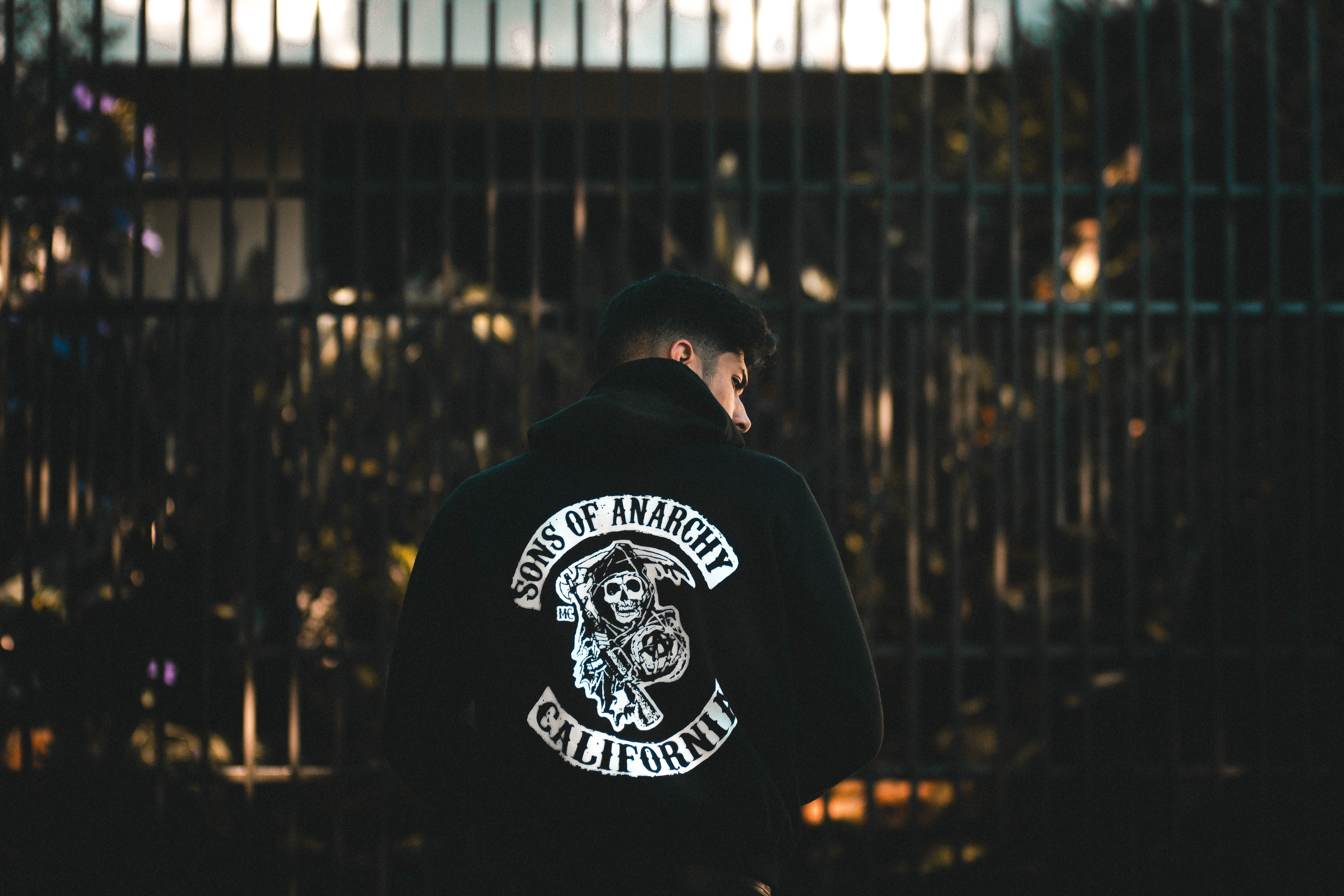 people, standing, rear view, city, day, clothing, real people, caucasian, text, indoors, fence, men, night, one man only, man, white, one person, lifestyles, HD Wallpaper