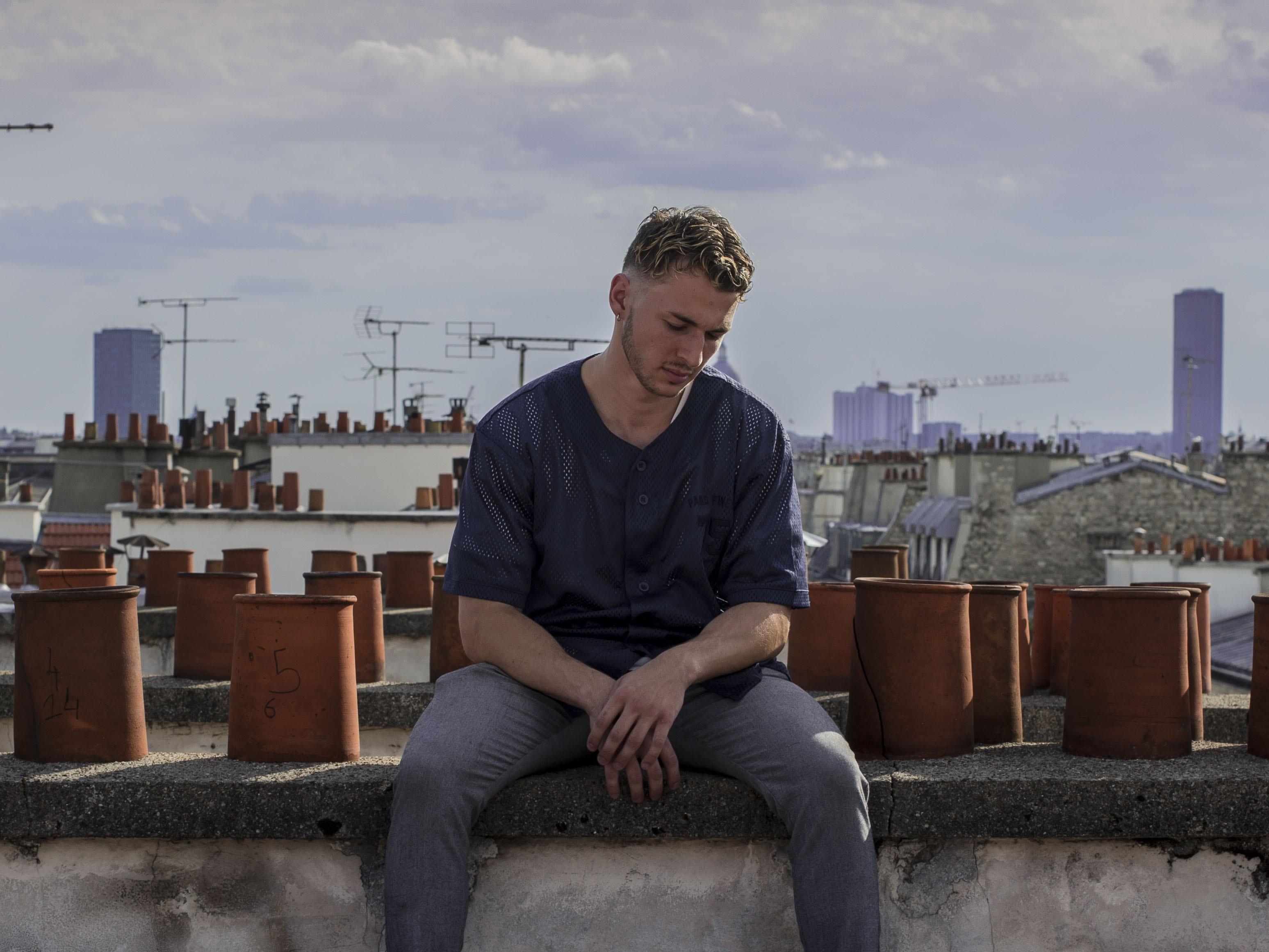 sit, building exterior, built structure, cloud - sky, teenager, city, man, rooftop, adolescence, leisure activity, casual clothing, portrait, guy, sitting, HD Wallpaper