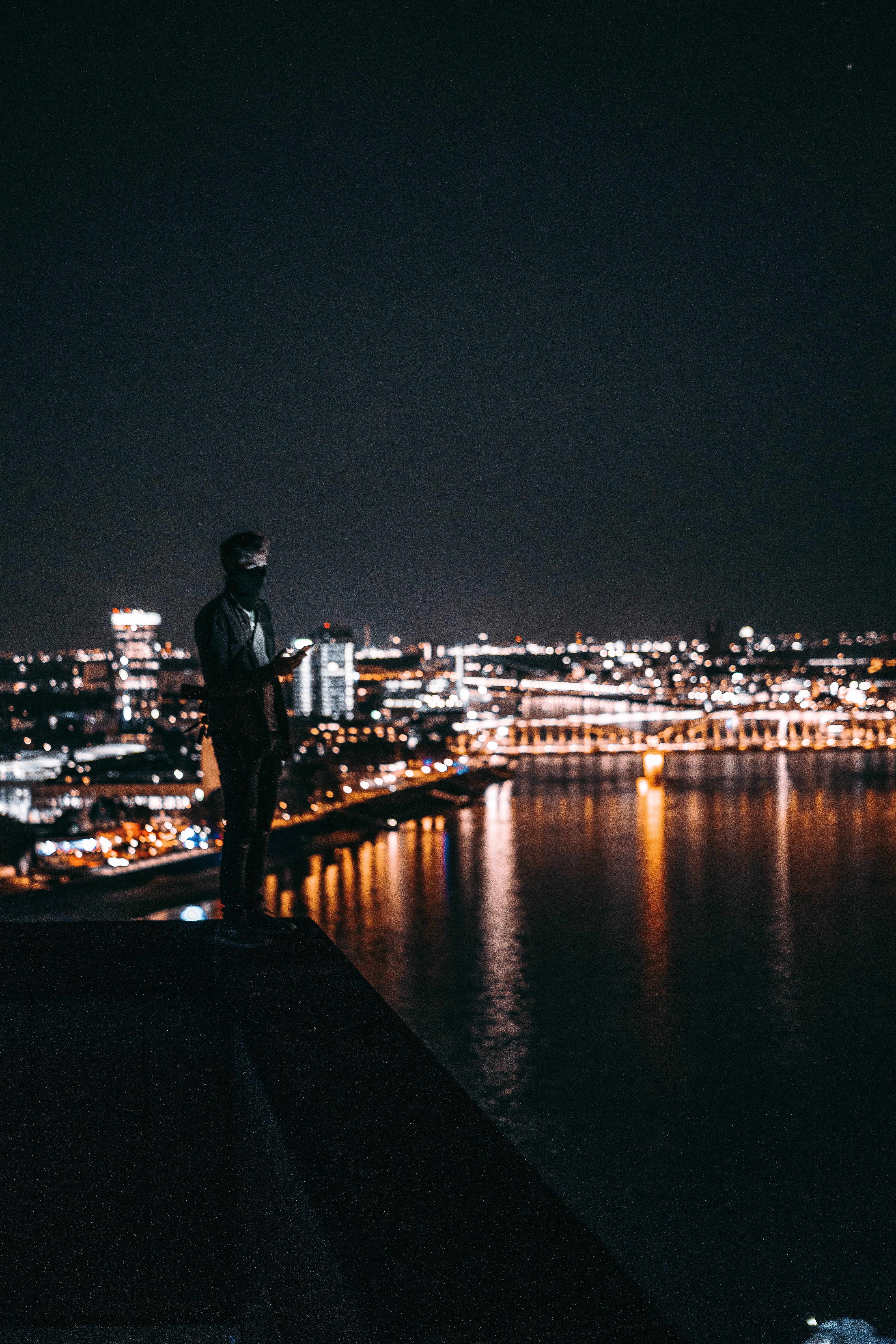 built Structure, person, river, males, light, dusk, background, business, businessman, men, front, architecture, standing, city Life, cityscape, Phone HD Wallpaper