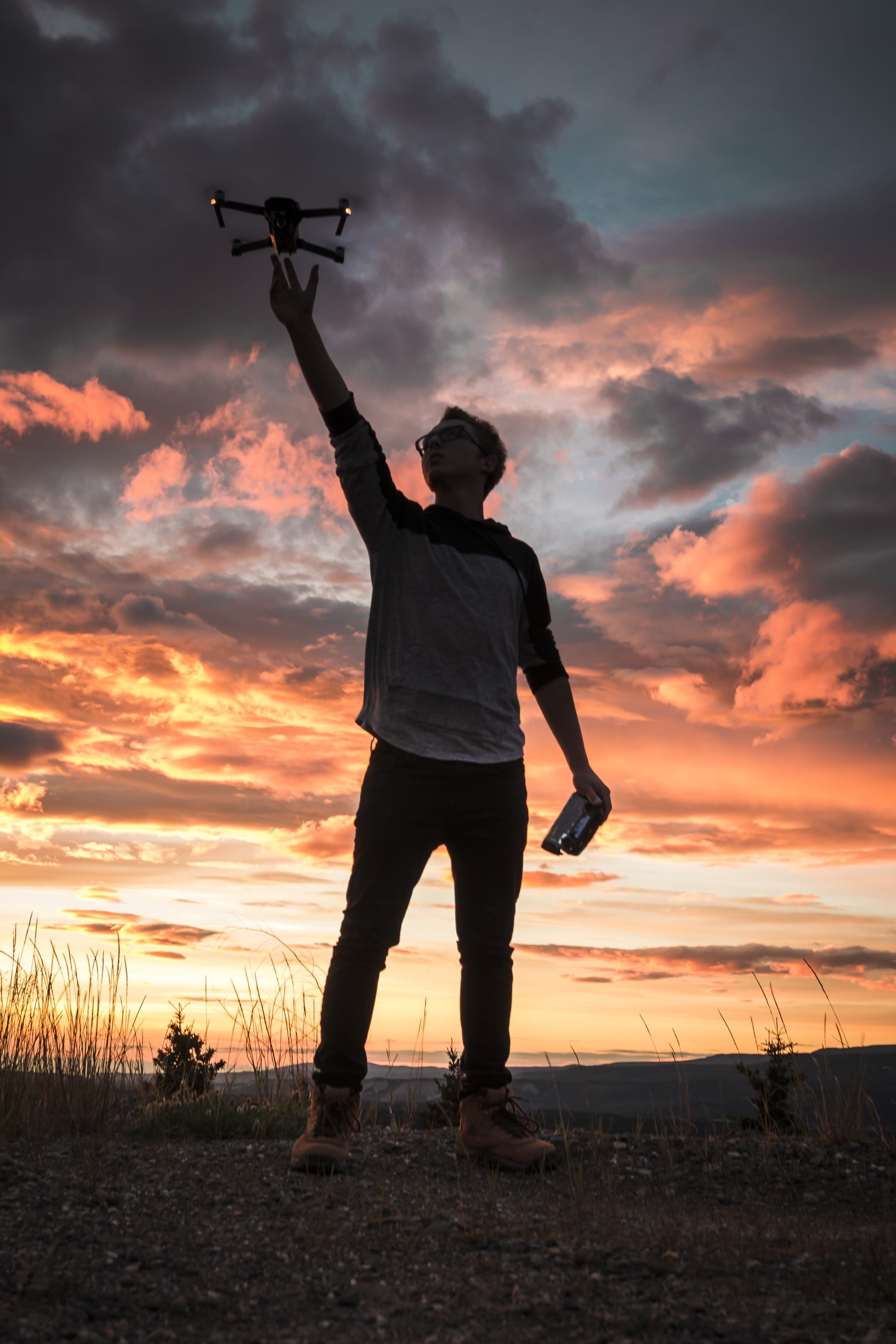 land, human arm, sky, photo, cloud - sky, rear view, one person, casual clothing, orange color, arms raised, lifestyles, 5K, full length, nature, holding, Phone HD Wallpaper