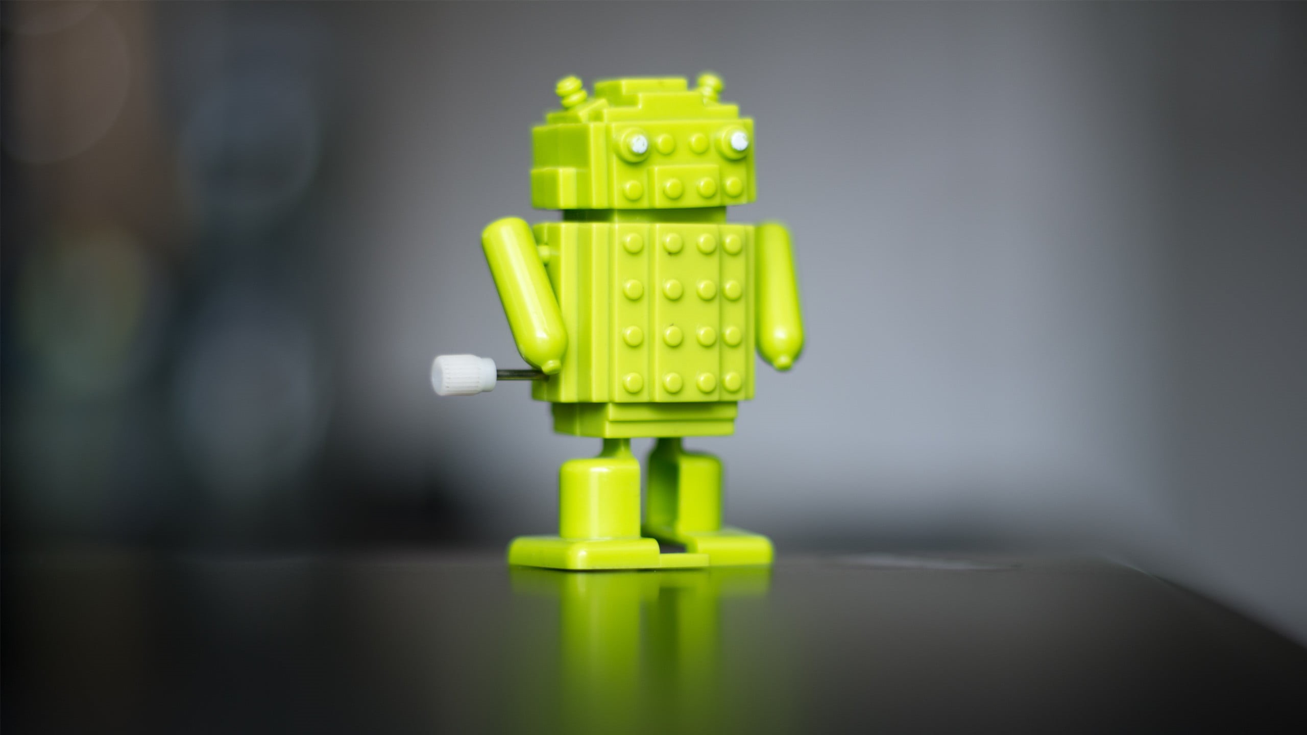 colored background, bokeh, robot, multi colored, single object, table, blurred, toy, toy block, technology, 2K, science, Android (operating system), small, HD Wallpaper