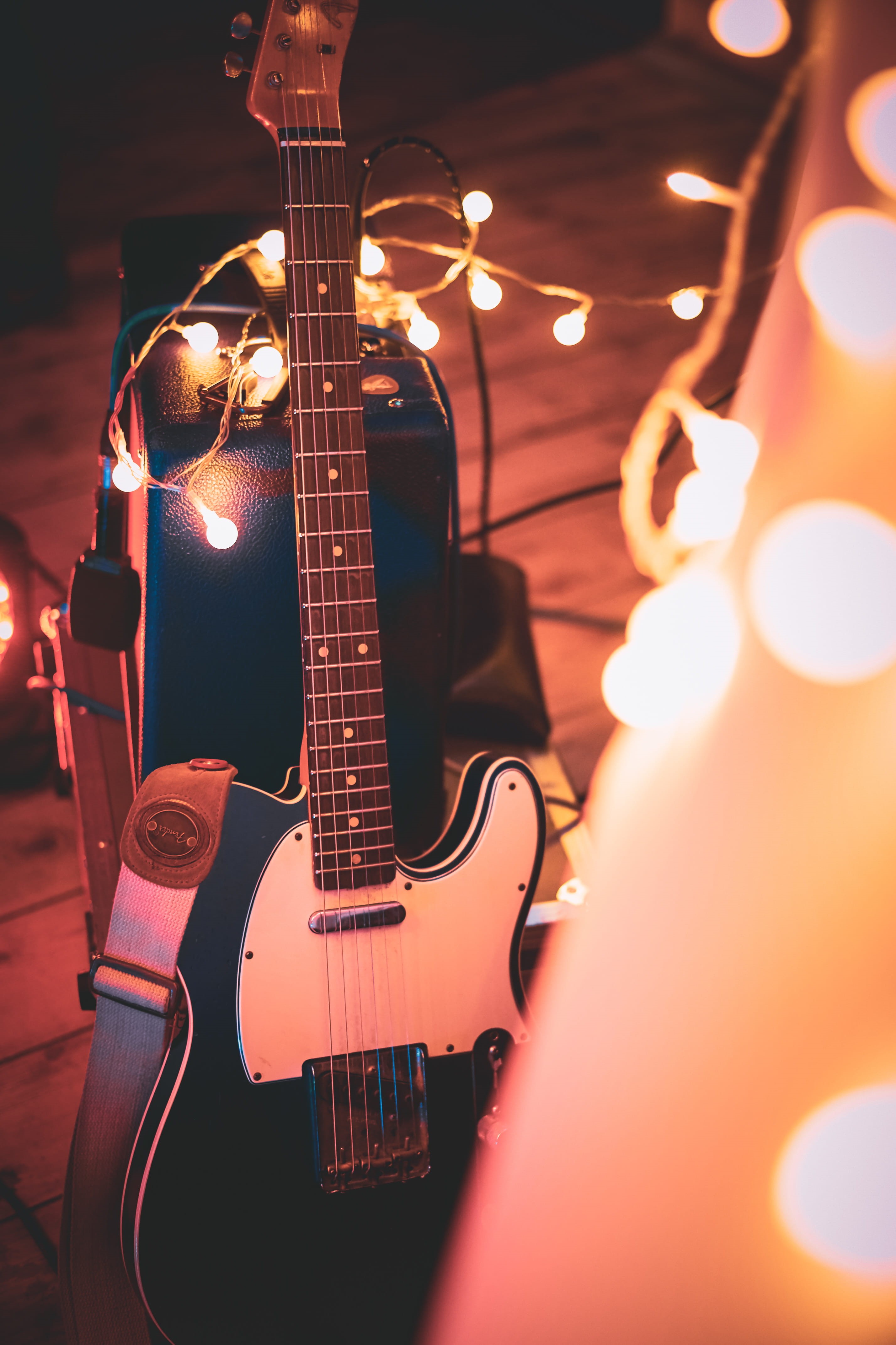 light - natural phenomenon, musical equipment, Guitarist, string, electricity, indoors, electric guitar, Guitar, still life, Rockstar, Fender, selective focus, Phone HD Wallpaper