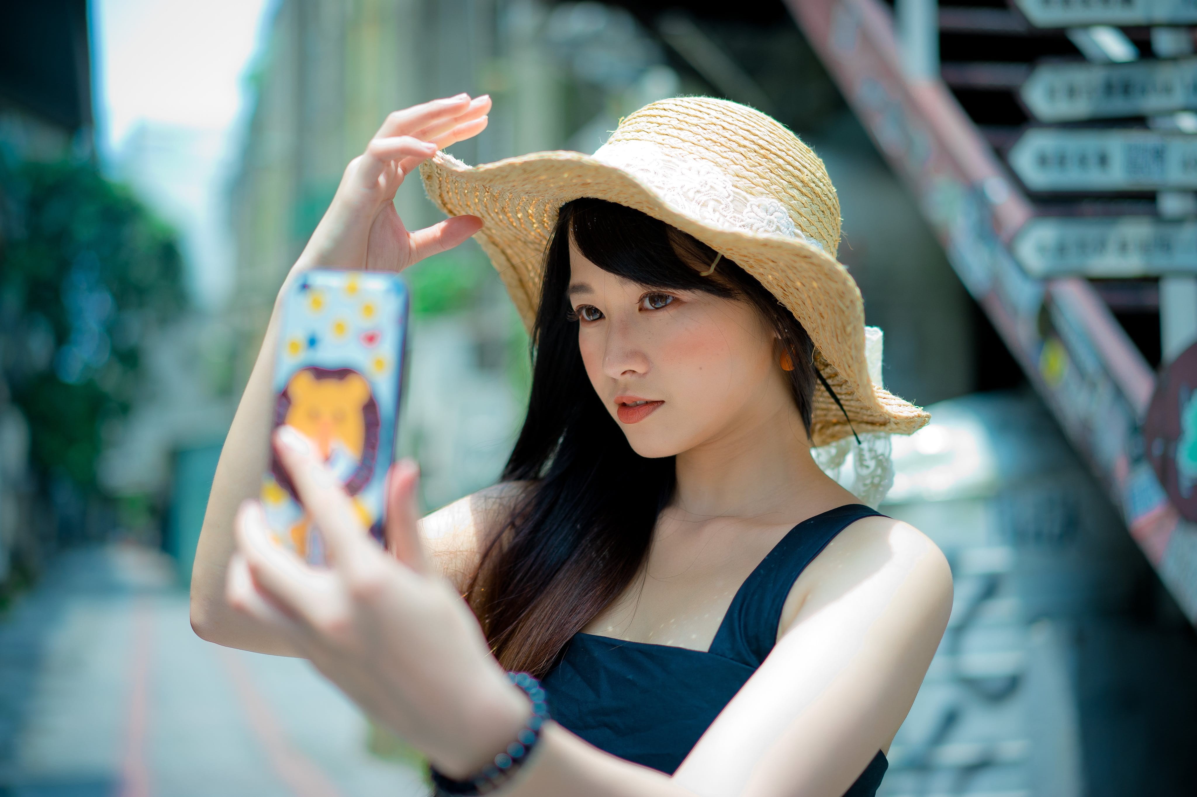 brown, beautiful, street corner, summer, person, one person, girl, photo messaging, camera, pretty, fashion, selfie, adult, woman, photography themes, holding, HD Wallpaper