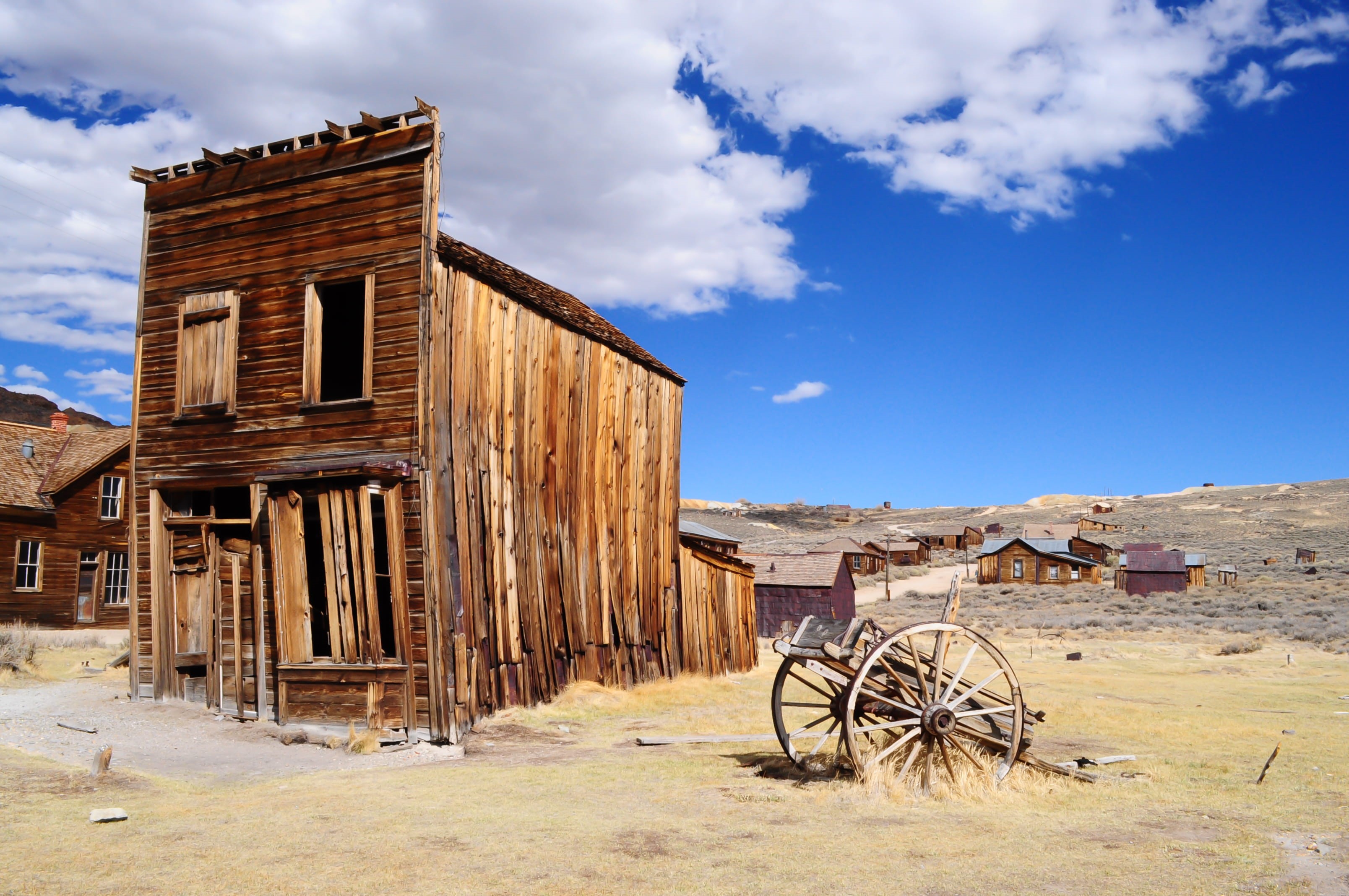 clouds, beside, day, no People, house, old, 2K, sunlight, ruined, run-Down, town, built Structure, land, desert, color Image, outdoors, obsolete, deterioration, HD Wallpaper