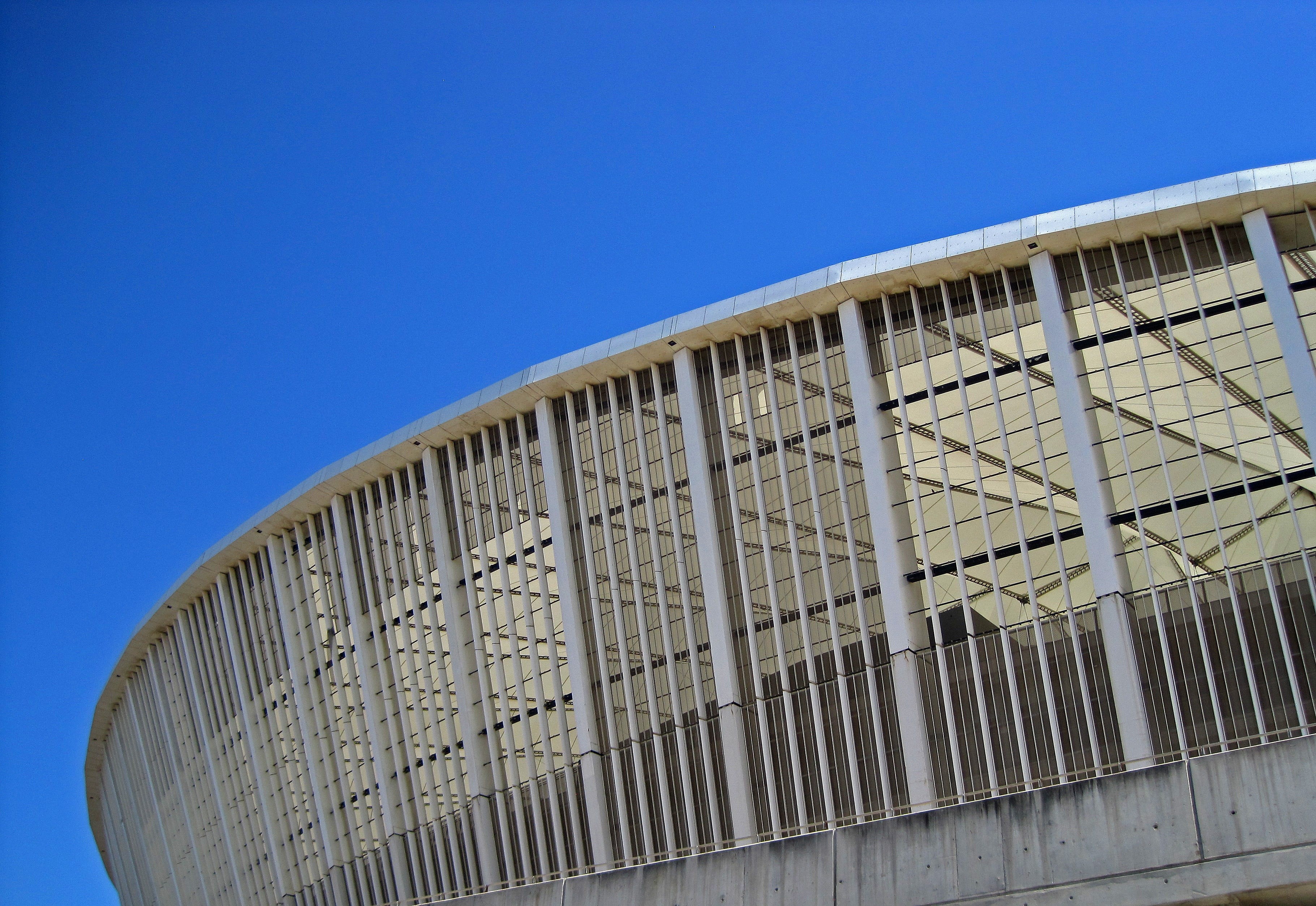 architecture, stadium, sunny, railing, nature, building exterior, clear sky, windows, 2K, grid, sport, metal, structure, copy space, travel destinations, HD Wallpaper