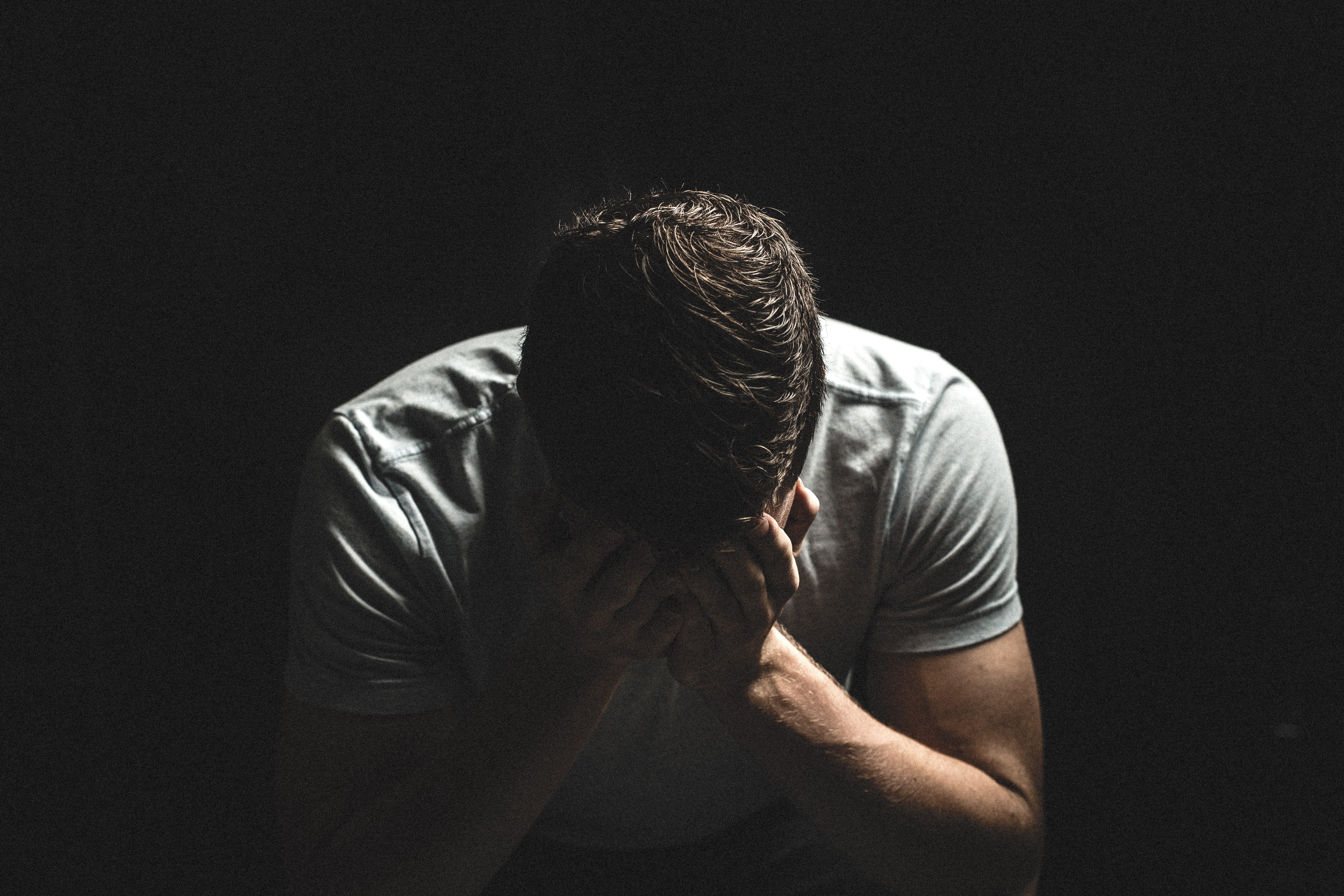 waist up, black background, one person, 4K, mid adult, shadow, eyes, men, disappointment, studio shot, rear view, mid adult men, sadness, covering, portrait, HD Wallpaper