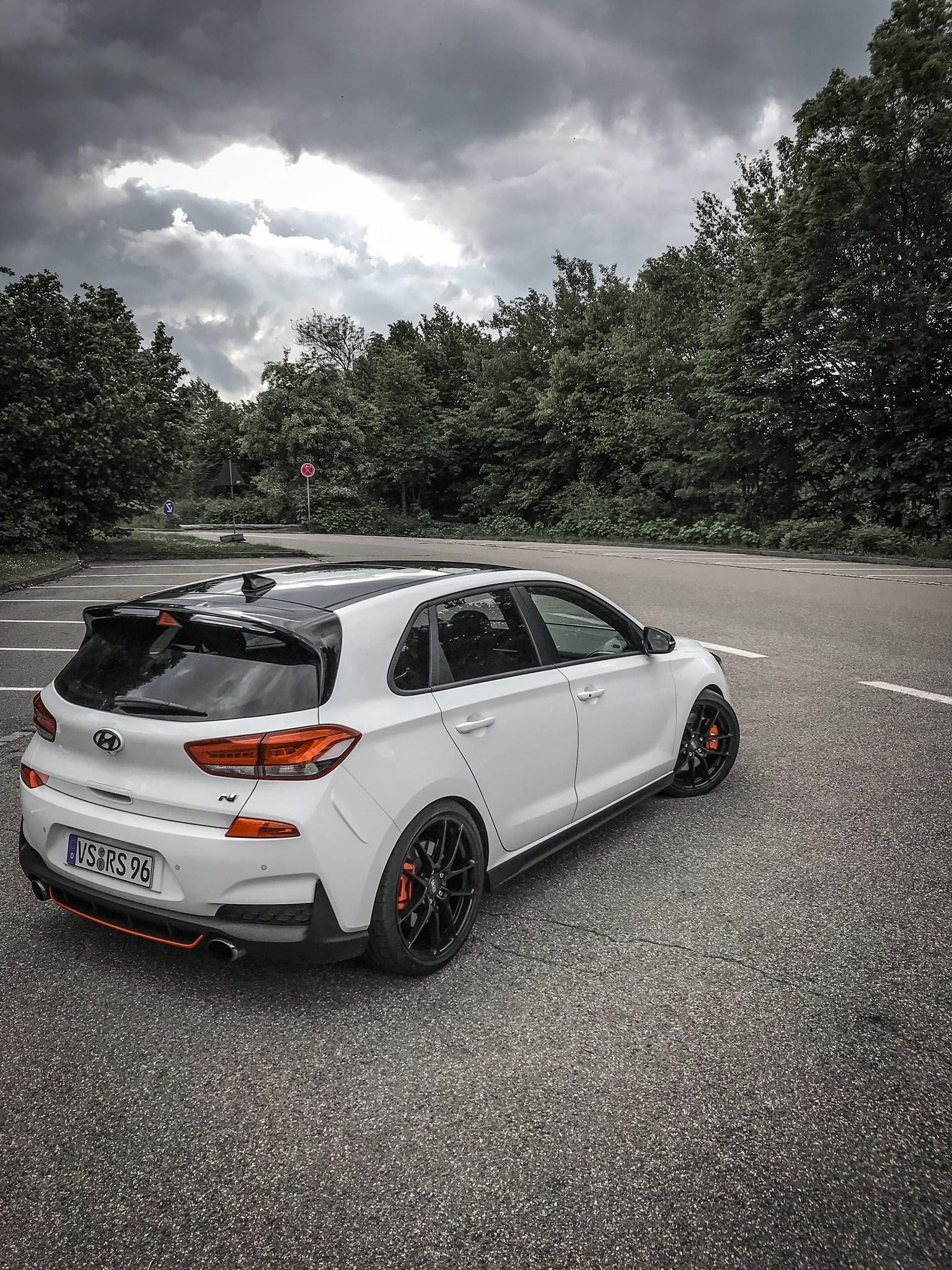nature, plant, rear angle view, car, no people, street, city, hatchbacks, mode of transportation, i30N, Hyundai, growth, outdoors, motor vehicle, cloud - sky, Phone HD Wallpaper