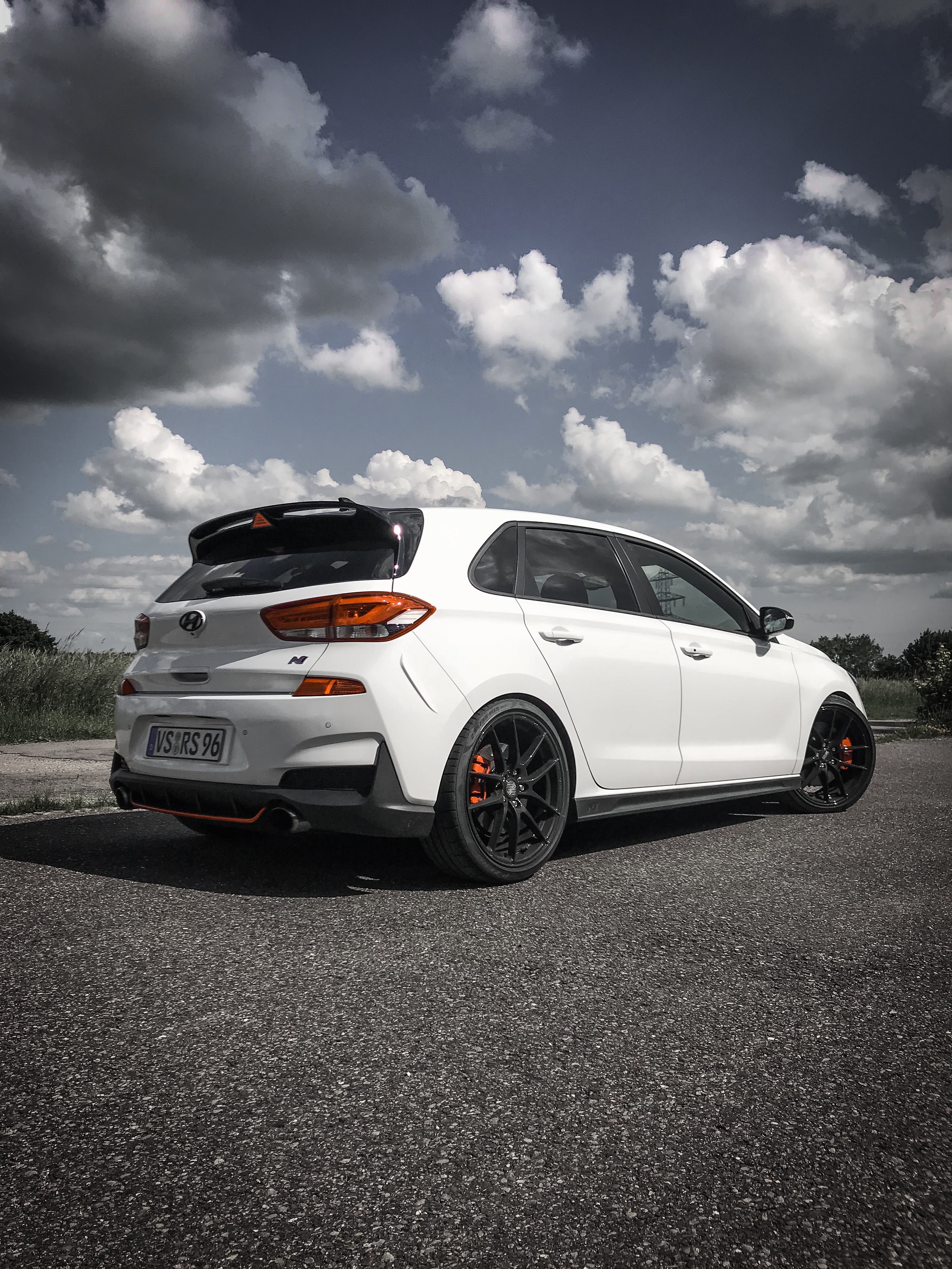 outdoors, i30N, hot hatch, sky, rear angle view, hatchbacks, mode of transportation, cloud - sky, car, Hyundai, motion, luxury, city, motor vehicle, street, Phone HD Wallpaper