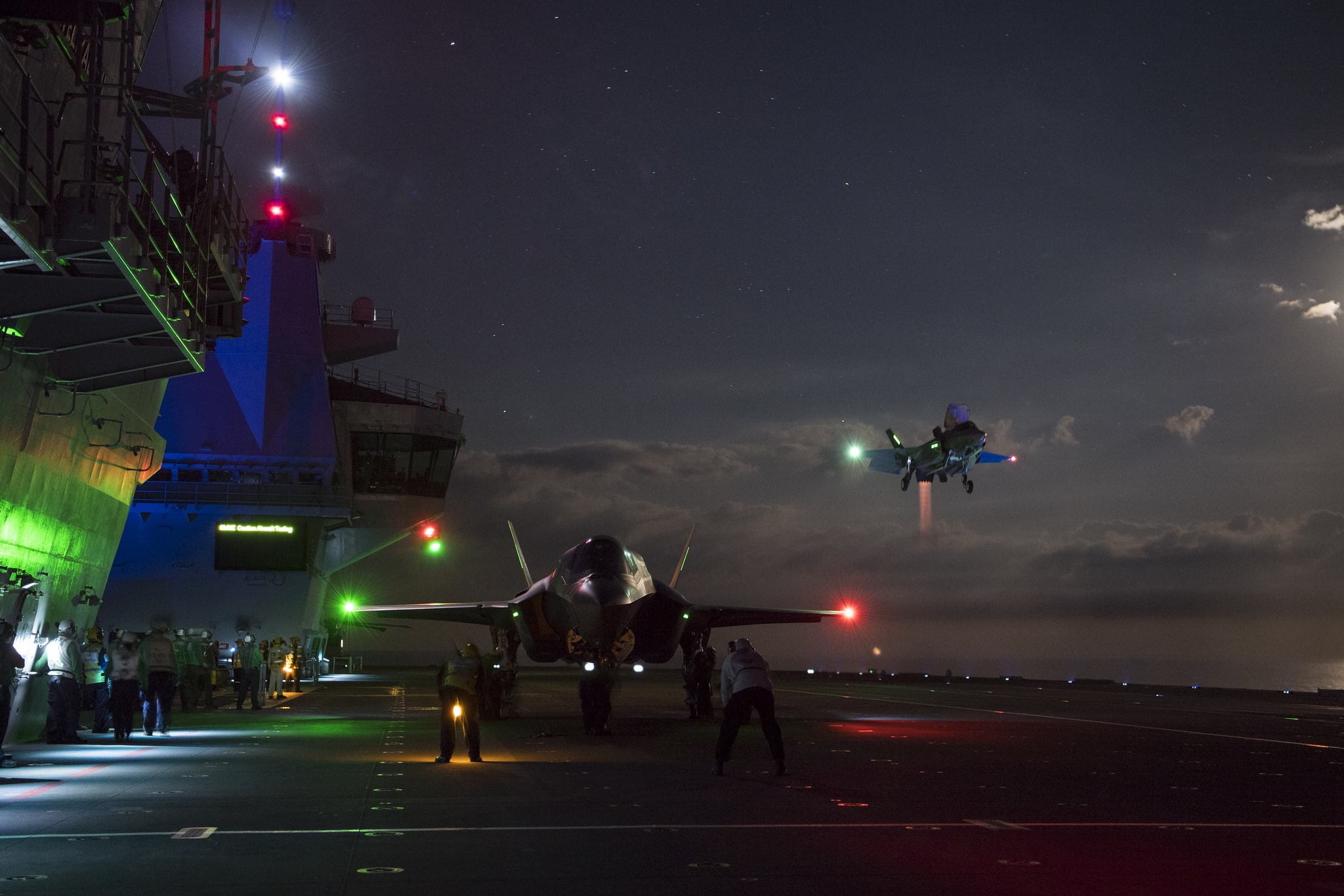 F-35B Lightning II, illuminated, sky, aircraft carrier, street light, light, 1080P, military, outdoors, group of people, transportation, real people, built structure, HD Wallpaper