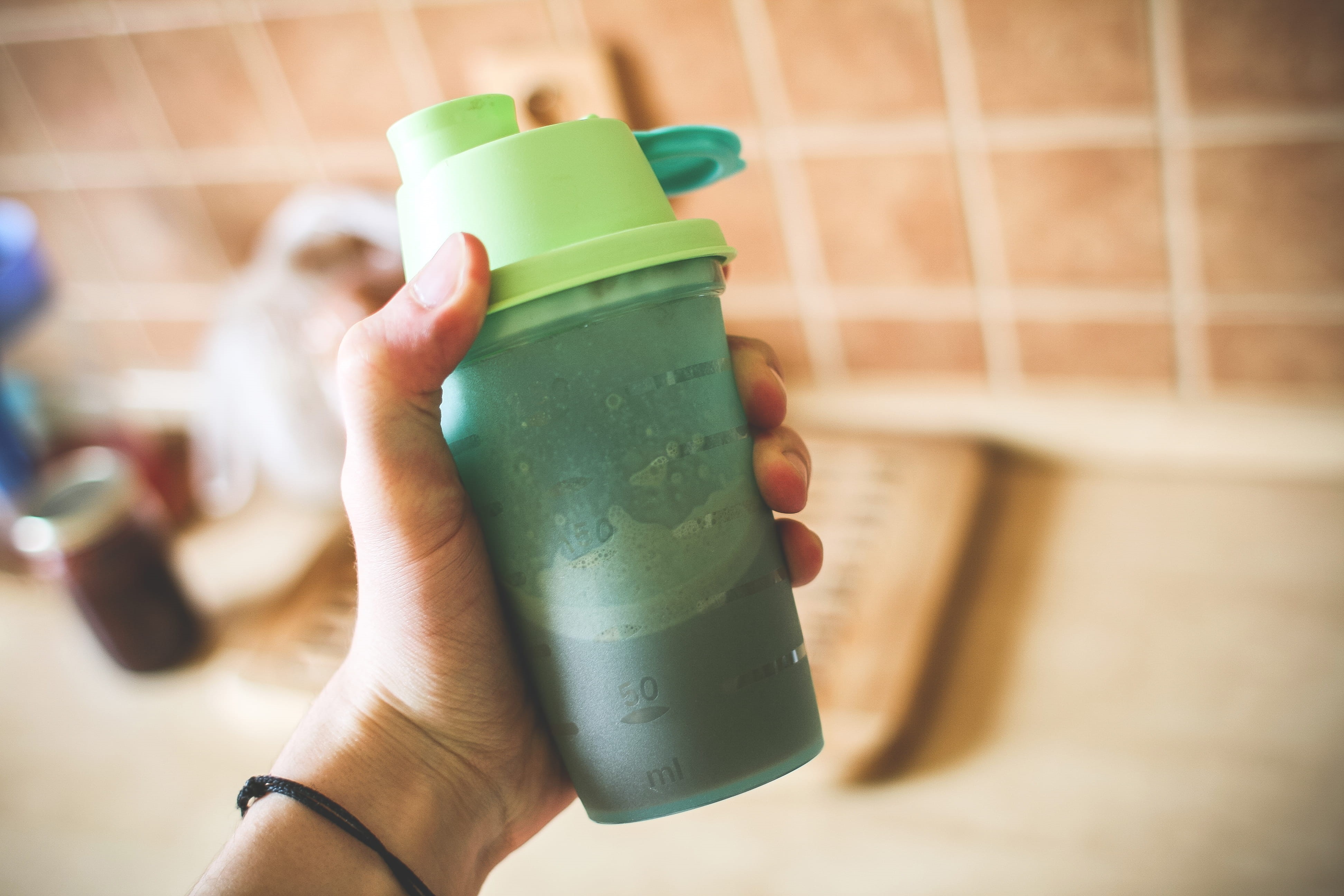 drink, human Hand, green color, Fitness, refreshment, Man, 4K, Holding, shake, food and drink, focus on foreground, hand, real people, healthy, Gainer, HD Wallpaper
