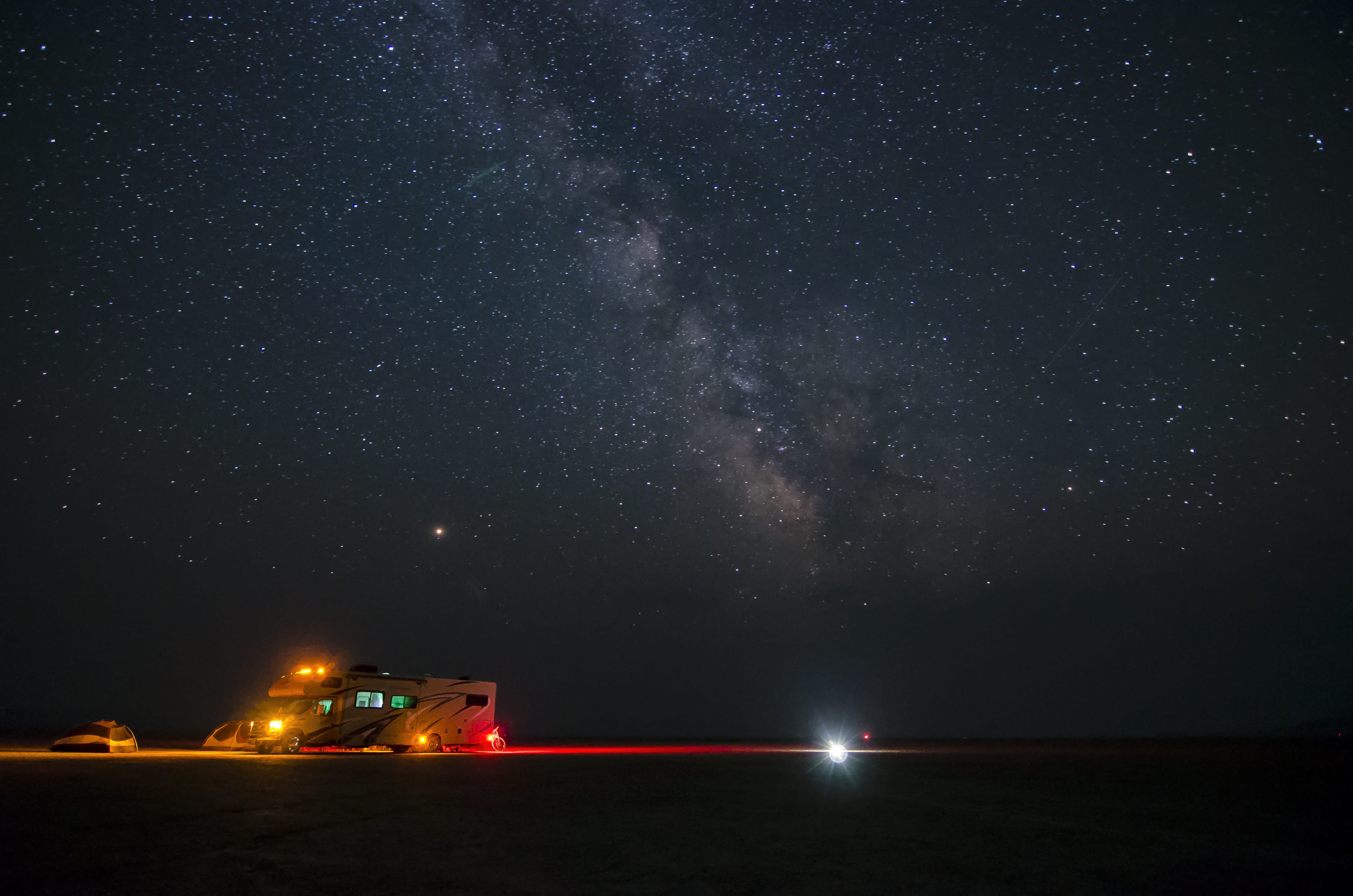 light - Natural Phenomenon, parking, astronomy, cosmic, illuminated, sky, space, cars, milky Way, 4K, planet - Space, parked, astro, travel, dark, adventure, HD Wallpaper