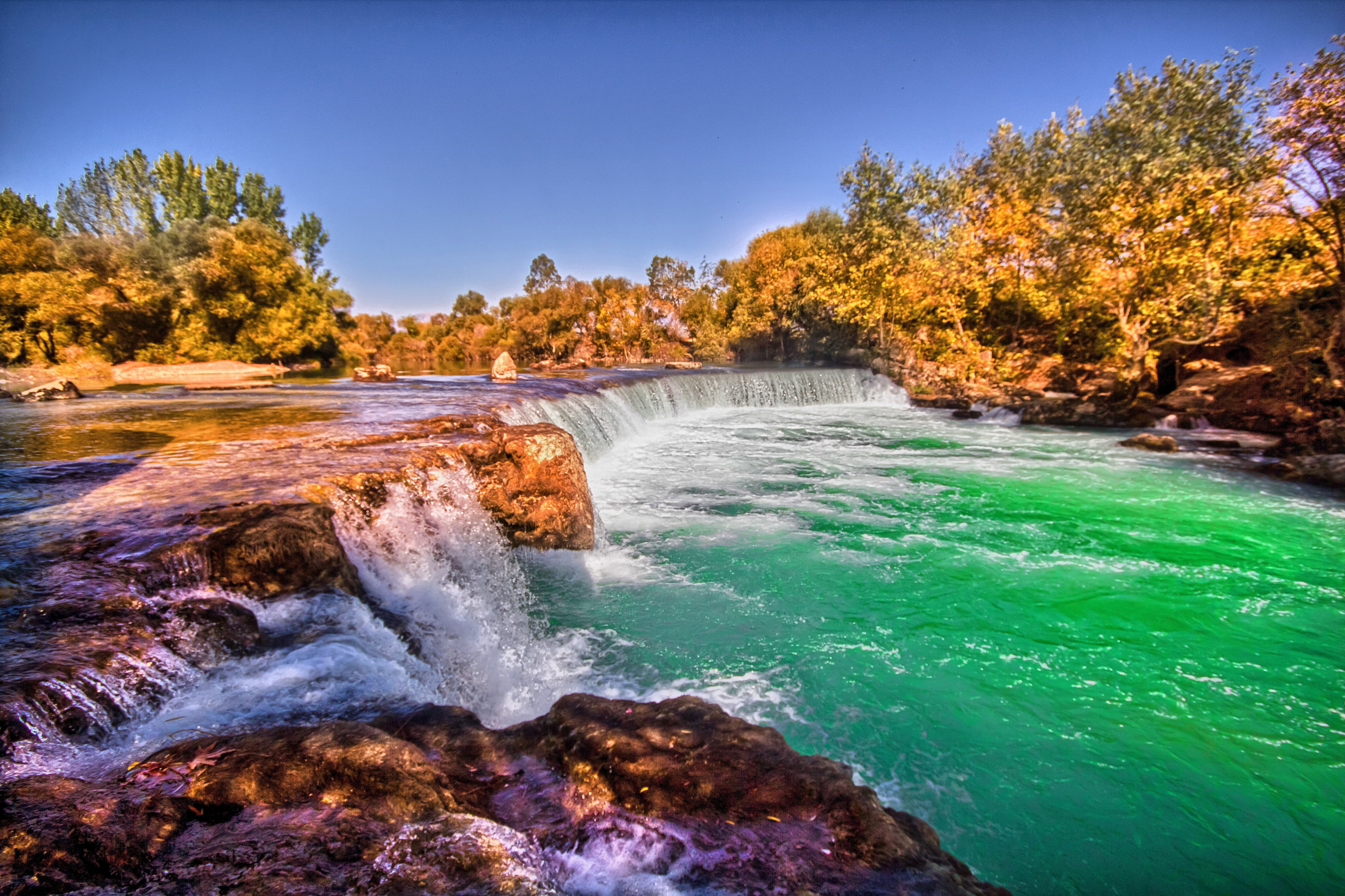 landscape, 5K, blue sky, surrounded, blue, autumn, manavgat  waterfall, sky, stream, turkey, blue  green, tree, water, trees, waterfall, nature, manavgat, HD Wallpaper